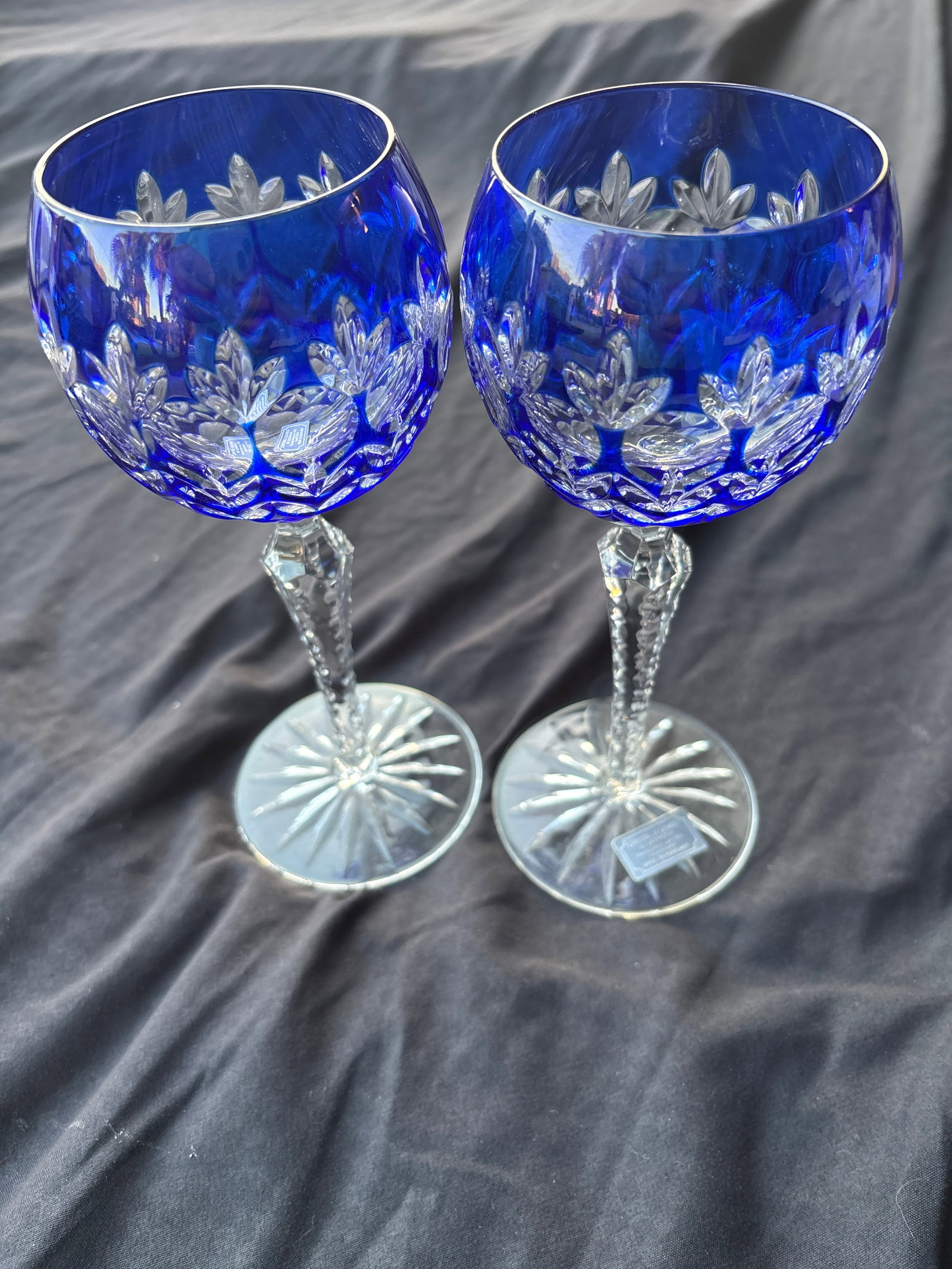 Two Godinger glass vintage Dynasty amethyst purple cut-to-clear crystal 8inch wine hocks: Two cobalt blue cut-to-clear crystal hock wine glass is part of the Dynasty collection by Godinger.Product DetailsPattern: The "Dynasty" pattern features a traditional Bohemian style with detailed lea