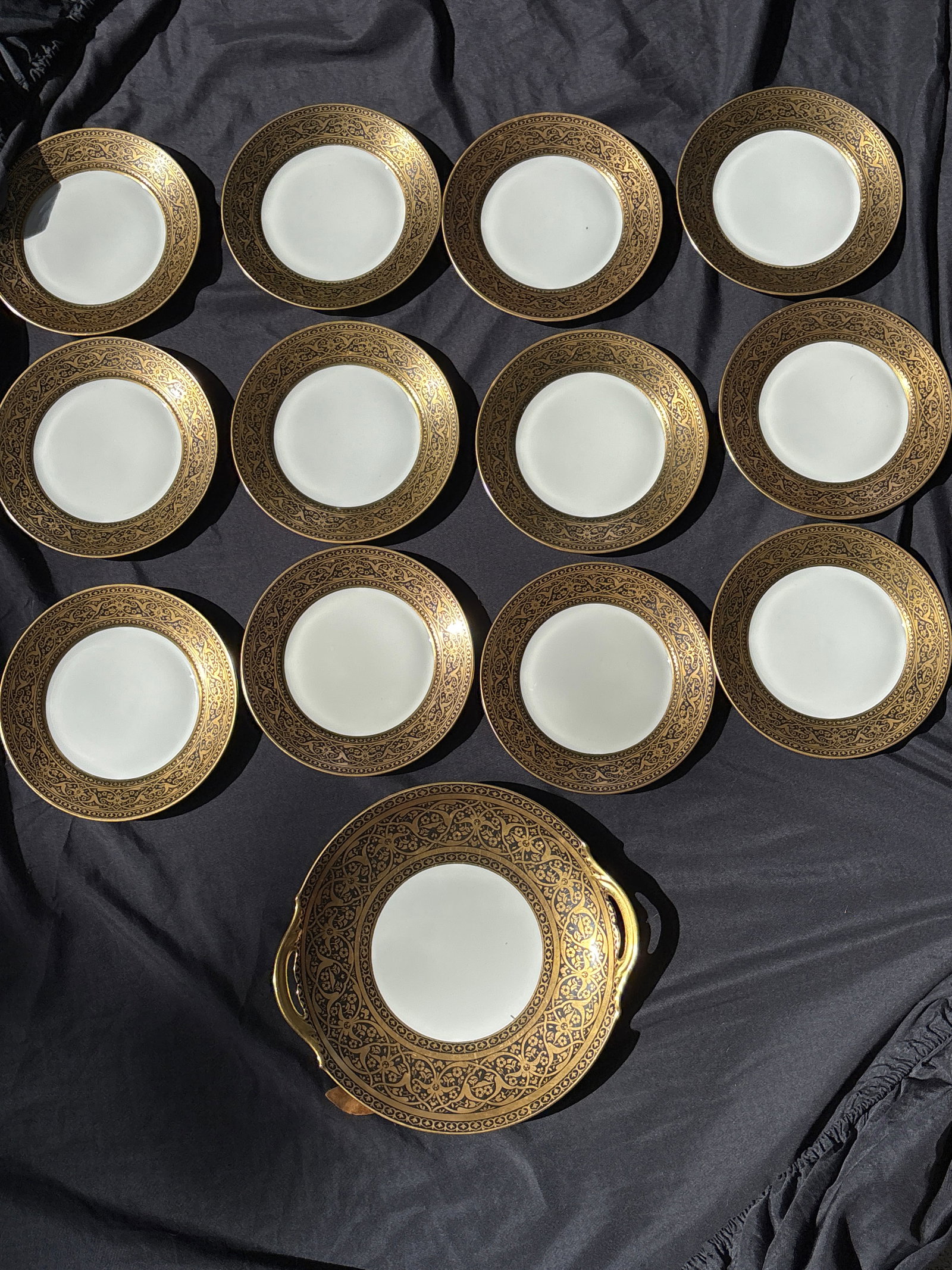 Elegant Thirteen piece set Limoges porcelain by F. Legrand & Cie France: Thirteen piece Limoges porcelain by F. Legrand & Cie, a renowned French manufacturer active from approximately 1865 to 1944. Twelve 7&1/4 inch plates & 11 inch serving plate.Item Details* Manufacturer