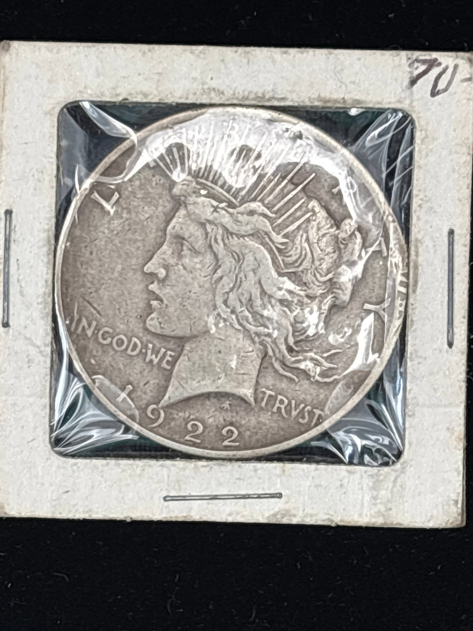 1922 United States Peace Silver Dollar: 1922 Peace silver dollar coin, which is made of 90% silver.Design Details: The obverse features the profile of Liberty wearing a radiant crown, designed by Anthony de Francisci.Mint Mark: The "D" mint