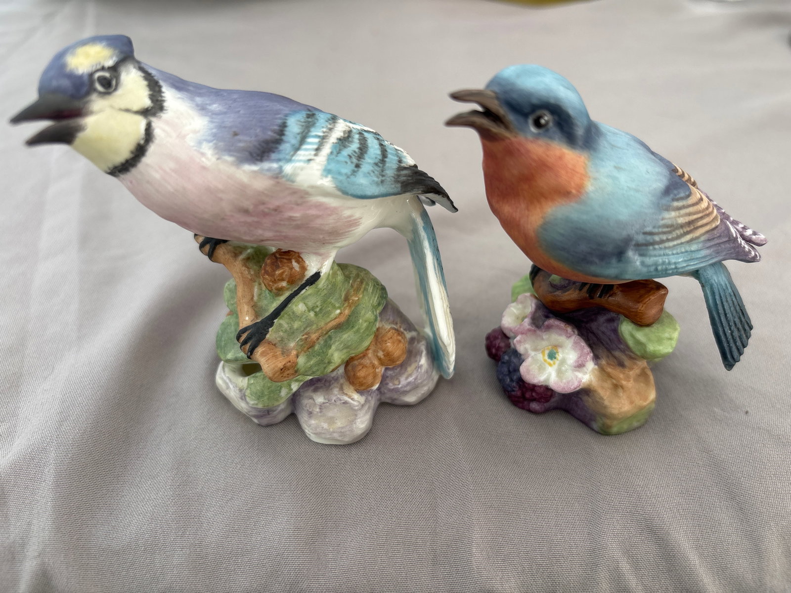 Two Royal Worcester bone china figurines; Blue Jay & Blue Bird: Two Royal Worcester bone china figurines; Blue Jay & Blue Bird; identified as model number 3646 & 3649Produced in England during the mid-20th century, this piece is part of a widely collected series o
