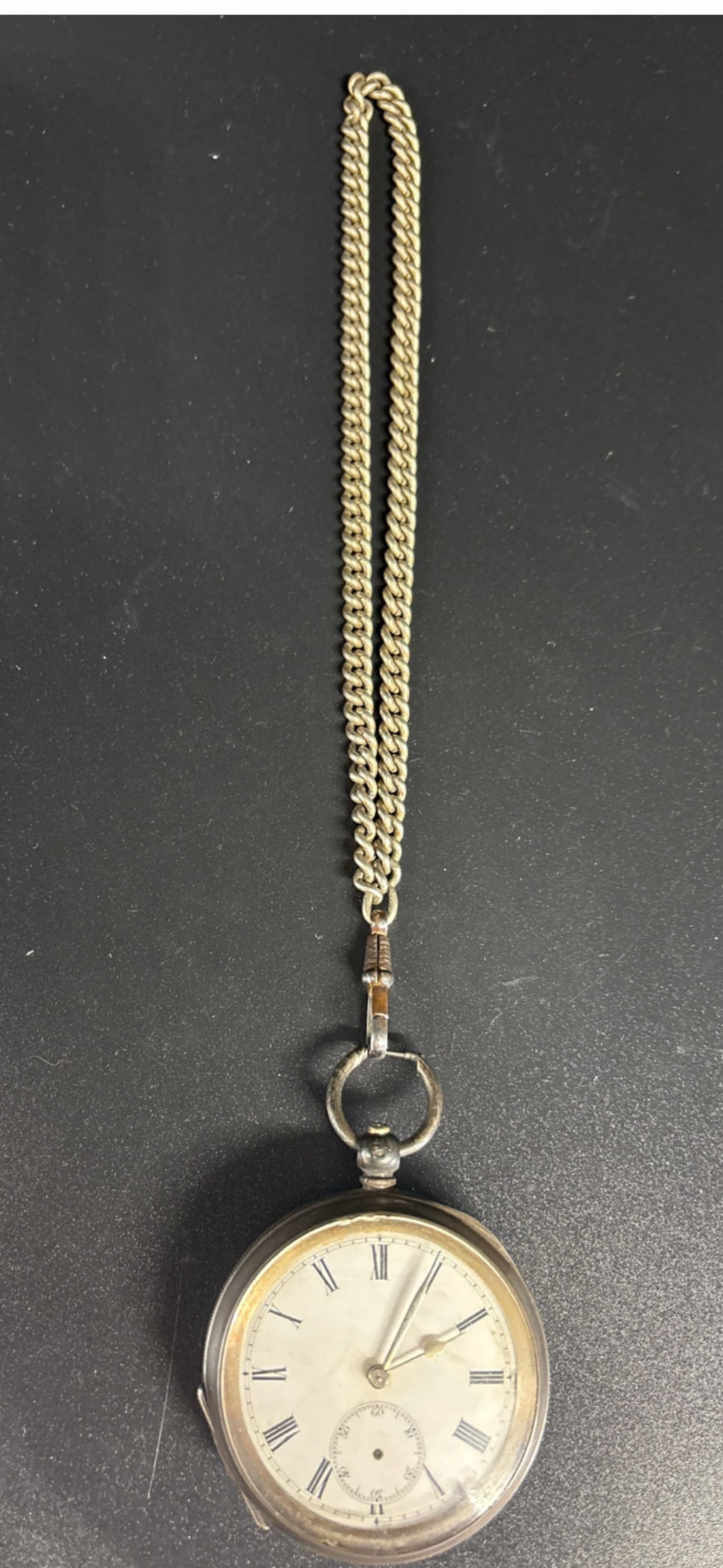 Victorian .925 silver English pocket watch, Roman numerals; 117 watch weight: A Victorian .925 silver English pocket watch, Roman numerals with secondary aperture dial (seconds hand there but loose). 117 Grams not including non-silver 14 inch chain. about 2&1/4 inches across.��