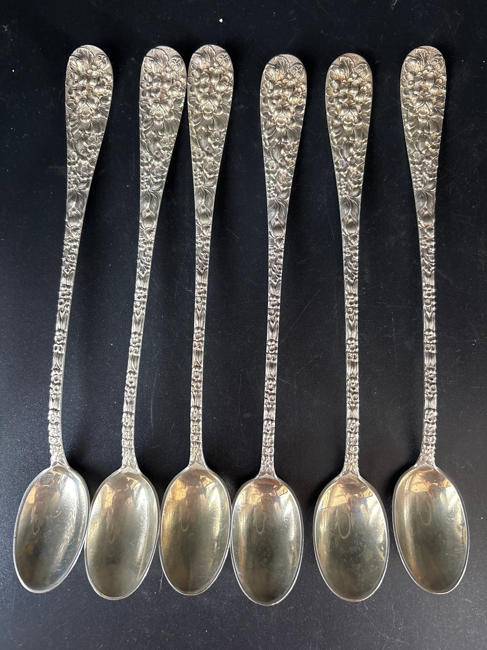 Set six large 8 inch Stieff Rose or Kirk Repousse sterling silver iced tea spoons;230 grams: Set of six 8 inch Stieff Rose or Kirk Repousse sterling silver iced tea spoons. These two patterns are very similar, both featuring an ornate, embossed "repousse" style that originated in Baltimore.Pr