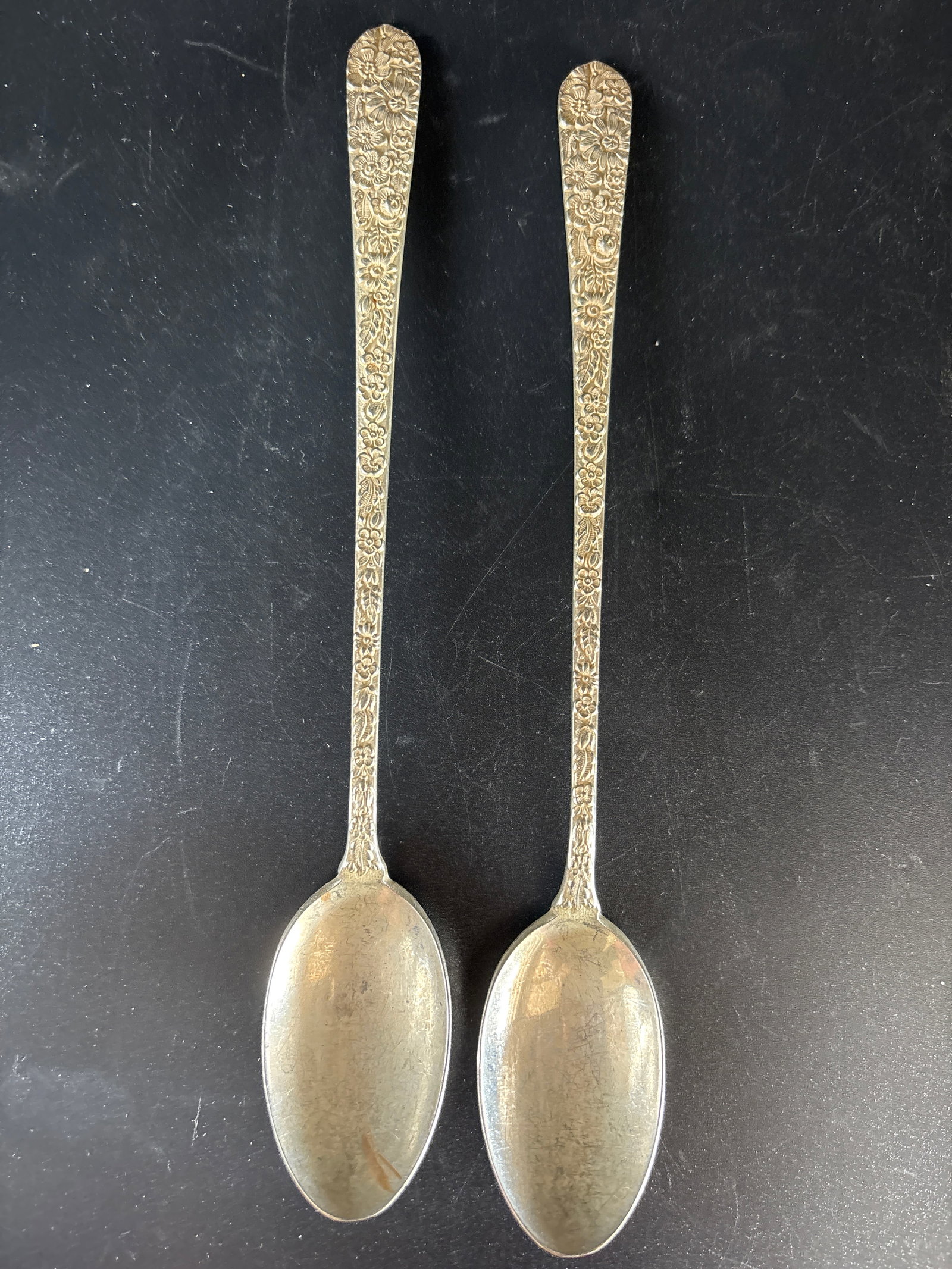 Pair 7&1/2 inch Alvin pat.1932 Repousse sterling silver iced tea spoons;66 grams: No monogram.Pair 7&1/2 inch sterling silver iced tea spoons. These two patterns are very similar, both featuring an ornate, embossed "repousse" style that originated in Baltimore.Product DetailsPatter