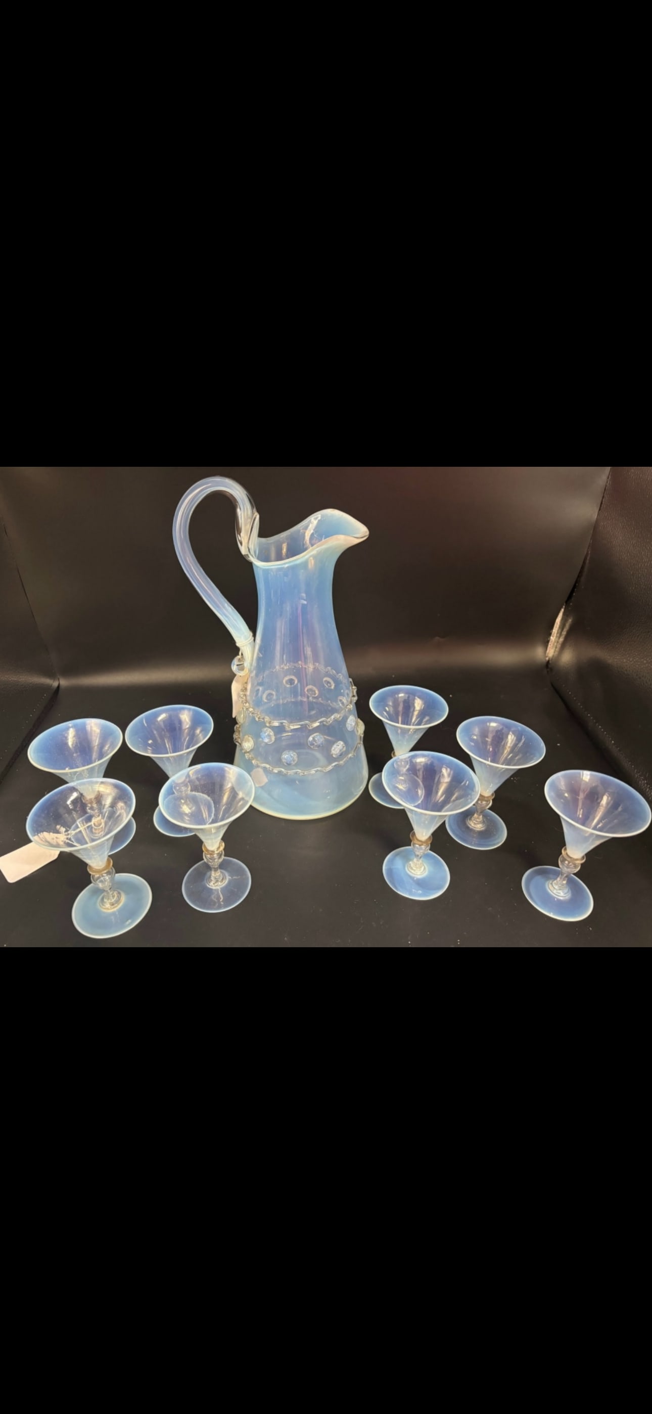 Nine piece set opalescent Murano glass by Nason Moretti: Nine piece set opalescent Murano glass pitcher, often attributed to designers like Nason Moretti or other prominent Venetian glassmakers, features a distinctive iridescent finish and applied clear gla