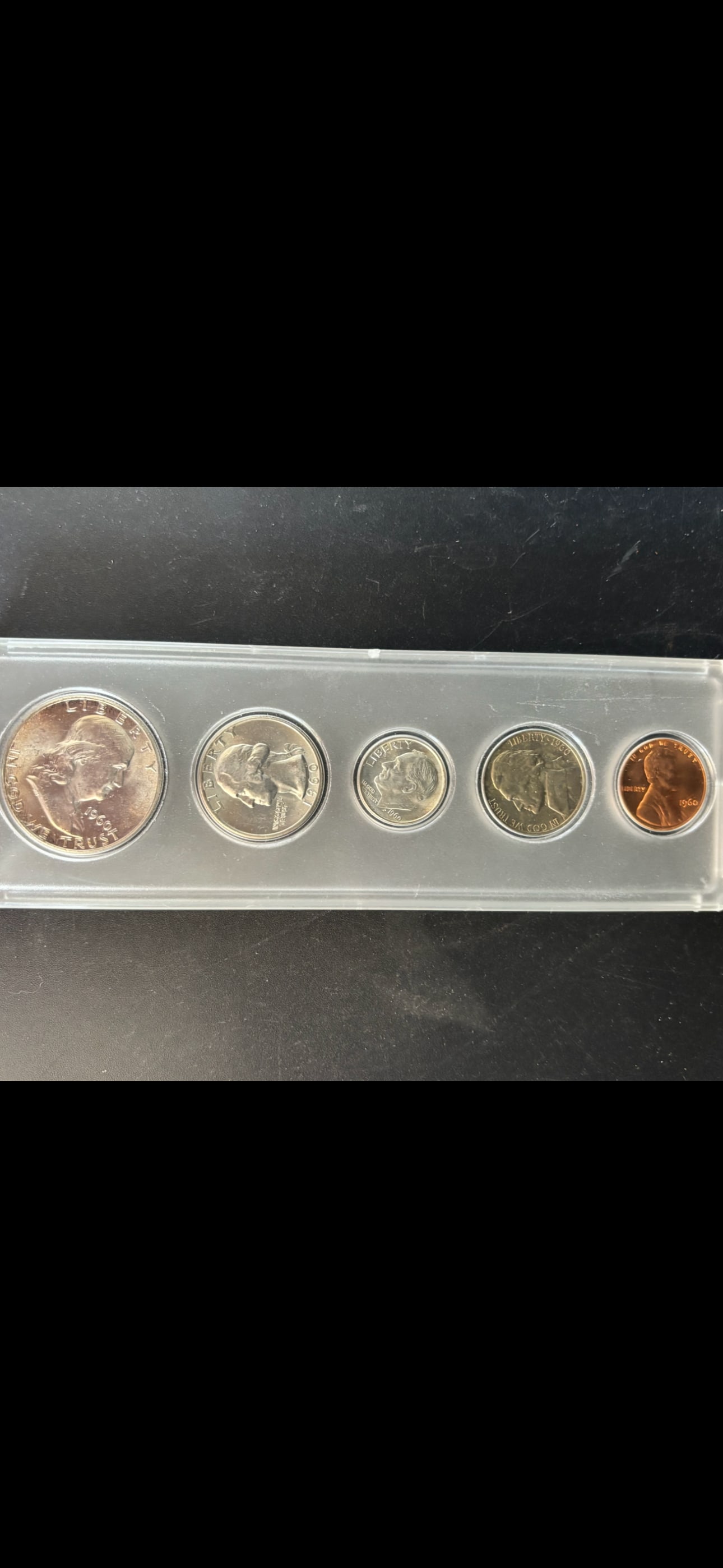 .61488 oz of pure silver Franklin 1960 United States Mint proof set: 1960 United States Mint proof set housed in a protective Whitman plastic holder.Set Composition: The set includes a Lincoln cent, Jefferson nickel, Roosevelt dime, Washington quarter, and a Franklin h