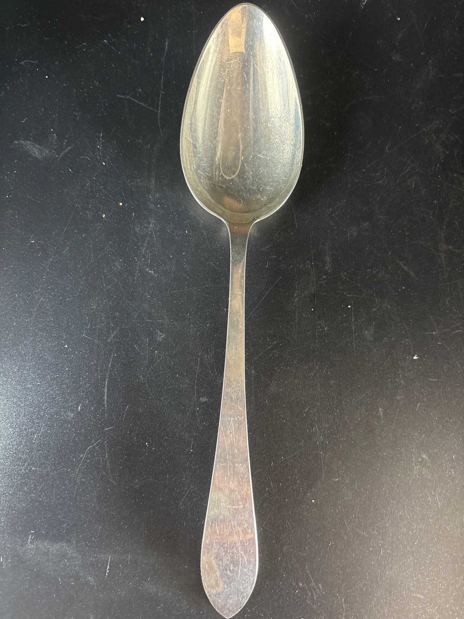 Tiffany Large 8&5/8 in sterling silver serving spoon; 107 grams: 107 grams, Tiffany & Co. sterling silver patterns that feature a simple, unadorned handle. Based on its visual profile and similar estate pieces, it resembles the Faneuil, Salem, or Clinton patterns.K