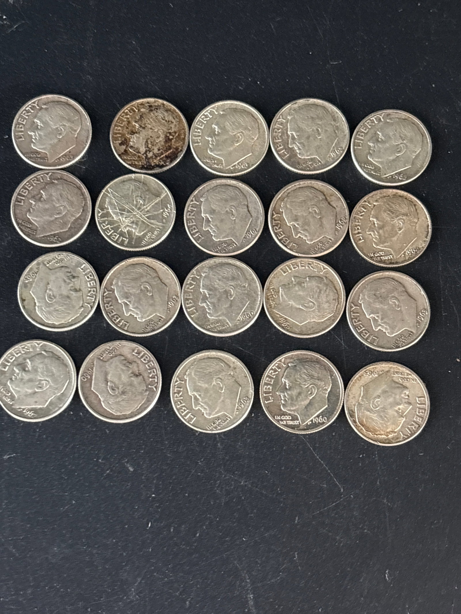 Twenty pre1964 Silver Roosevelt ten cent dime United States coins: Twenty assorted 1960’s Silver United States Roosevelt dime, featuring a portrait of President Franklin D. Roosevelt on the obverse.Coins from this era (pre-1965) are typically composed of 90% silver