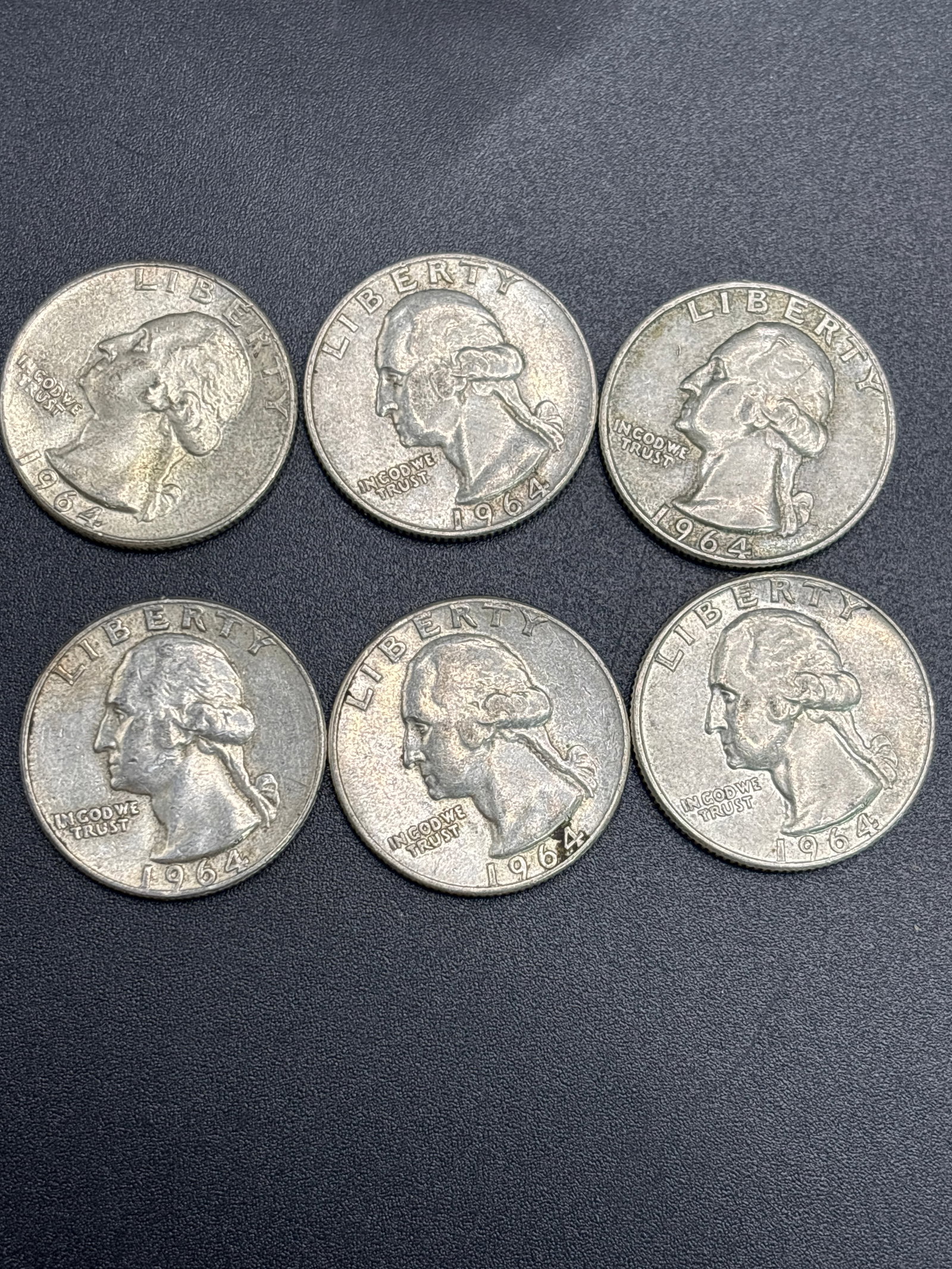 Set of six 1964 United States Washington quarters: Set of six 1964 United States Washington quarters, composed of 90% silver.1964 was the last year these quarters were struck with silver for circulation.