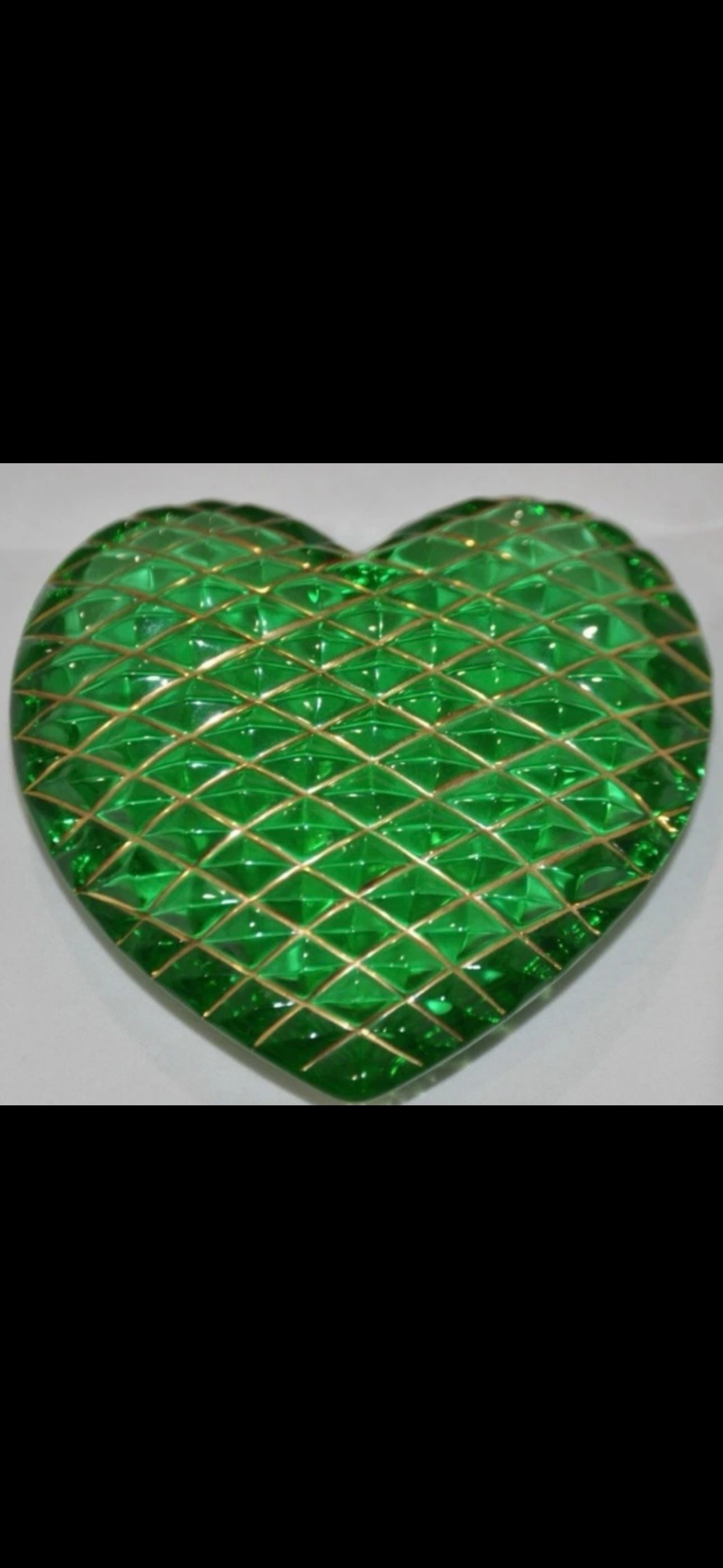 rare vintage Hermes St. Louis emerald crystal paperweight: This is uranium glass!rare vintage Hermes St. Louis emerald crystal paperweight features a quilted diamond pattern with 24k gold gilding.Brand: Hermes St. Louis.Material: Crystal with 24k gold