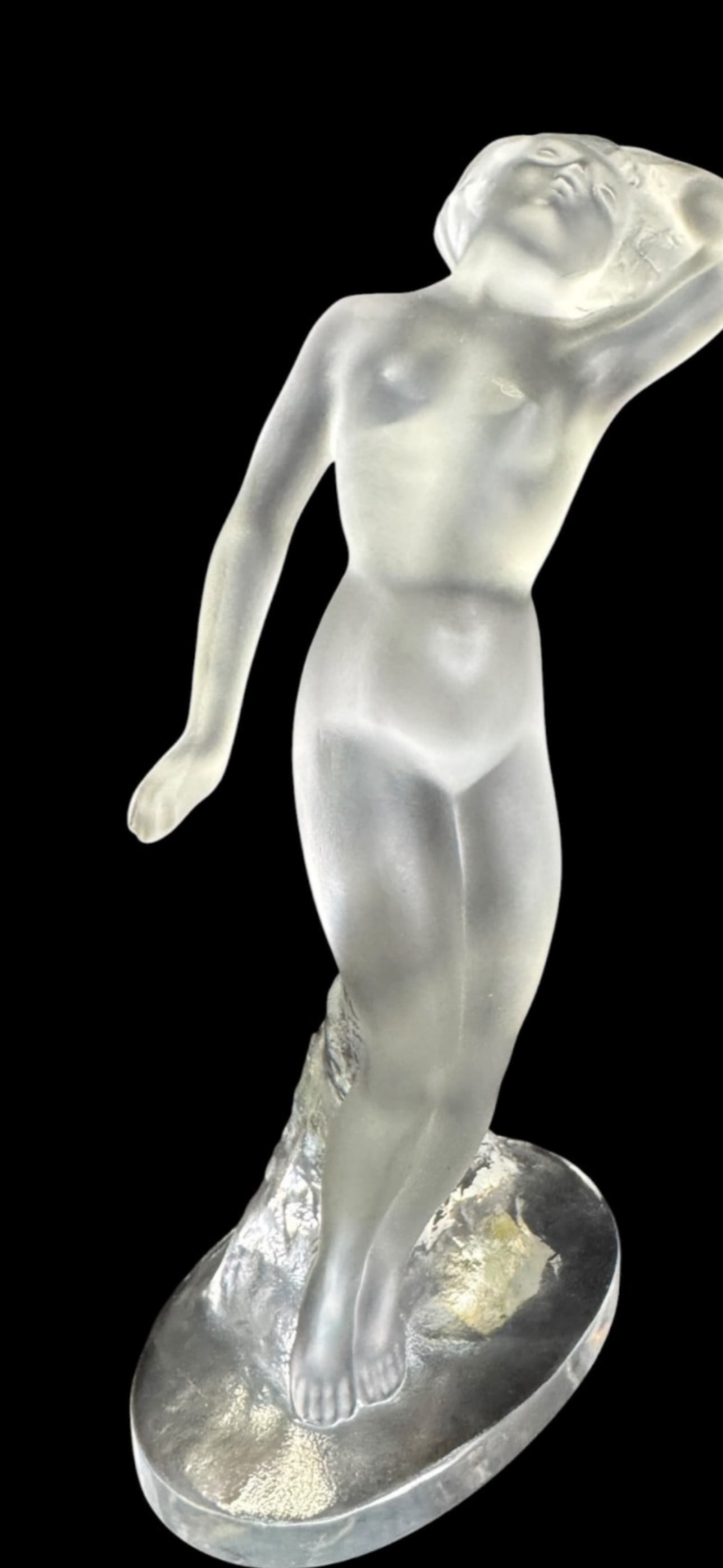 authentic Lalique France "Danseuse Bras Baissé" (Dancer,Lowered Arm) 9.5 crystal statue: authentic Lalique France "Danseuse Bras Baissé" (Dancer with Lowered Arm) frosted crystal figurine.Artwork DetailsDesigner: Sculpted by Marc Lalique (son of founder René Lalique).Design Era: Origina