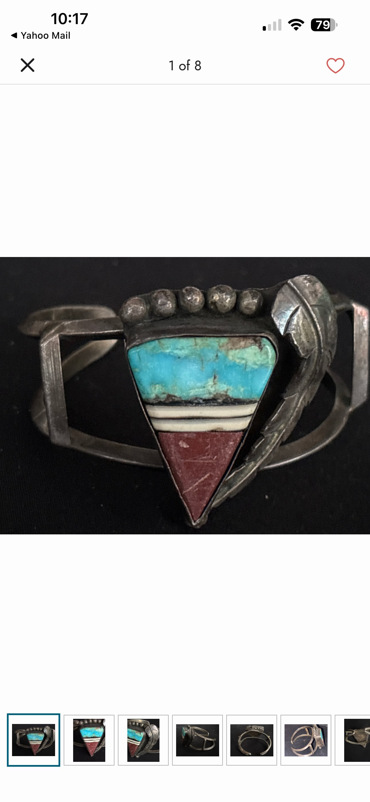 intage cuff bracelet appears to be a Zuni sterling silver piece; 40 grams: intage cuff bracelet appears to be a Zuni sterling silver piece featuring intricate triangular inlay work with turquoise, coral, and other stones.The bracelet likely utilizes a sterling silver base, w