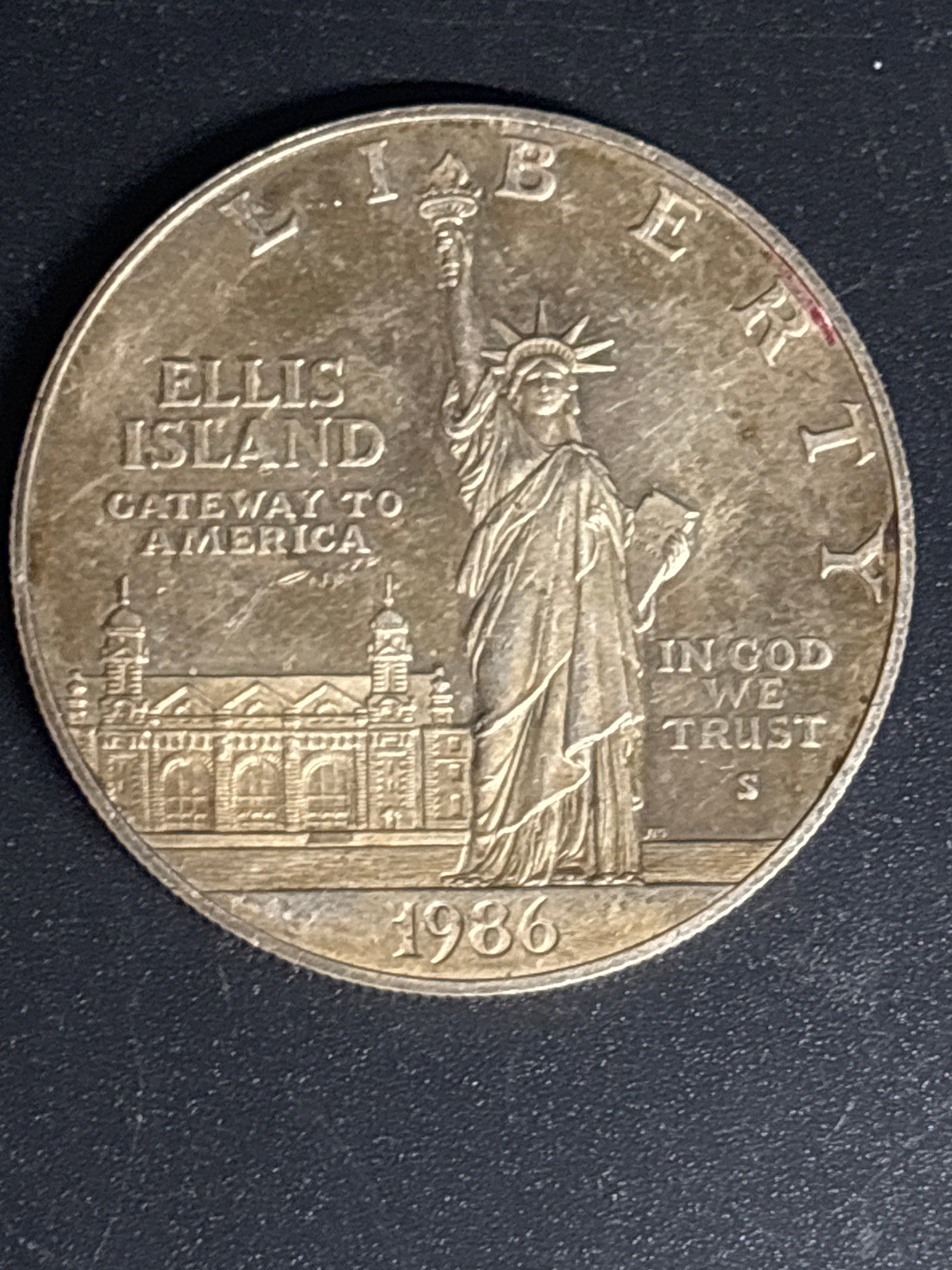 1986-S Statue of Liberty Centennial Commemorative Silver Dollar: 1986-S Statue of Liberty Centennial Commemorative Silver Dollar. It was issued by the United States Mint to celebrate the 100th anniversary of the dedication of the Statue of Liberty and to support th