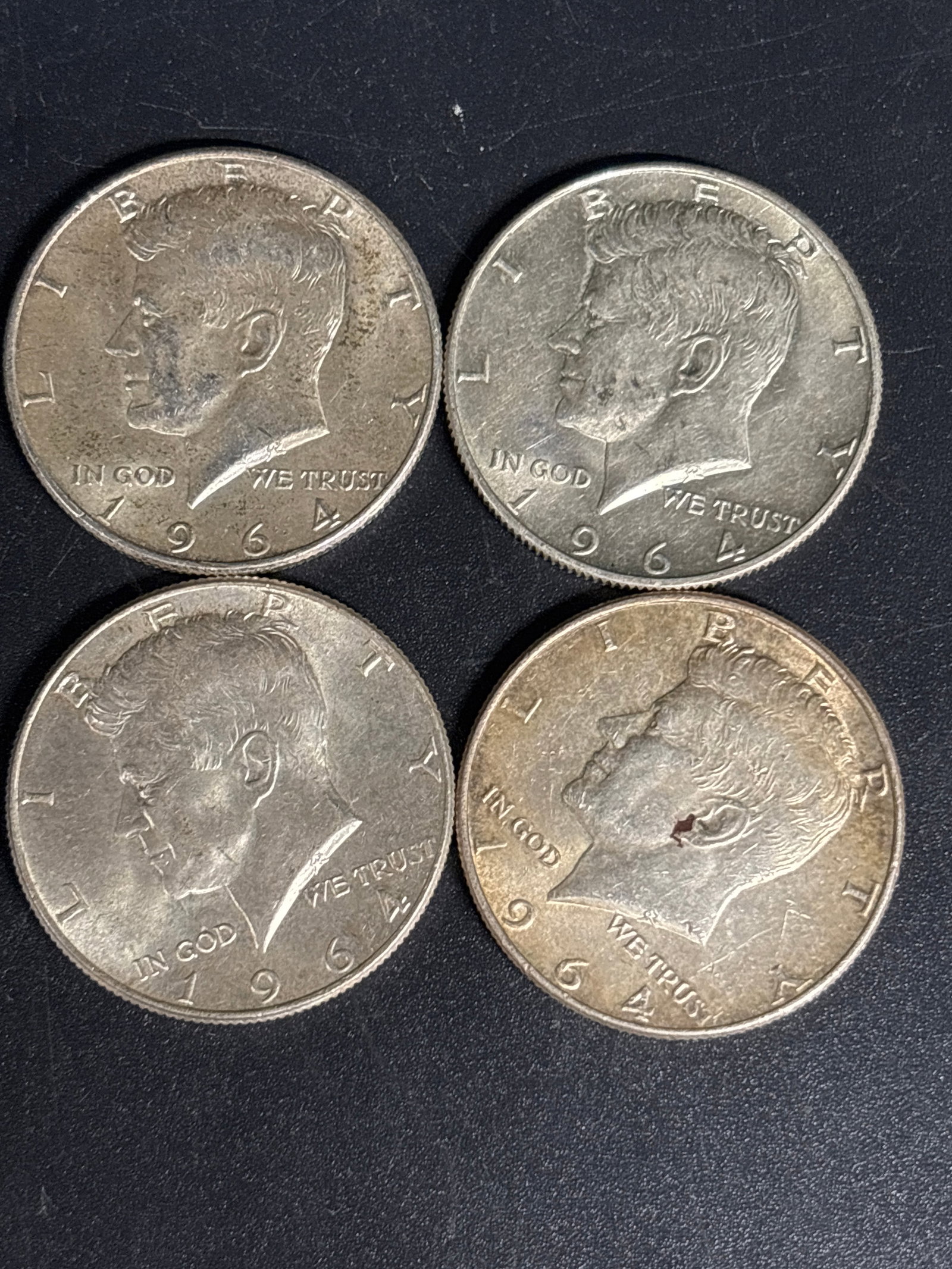 Four 1964 Kennedy Silver half dollars (1 of 4)