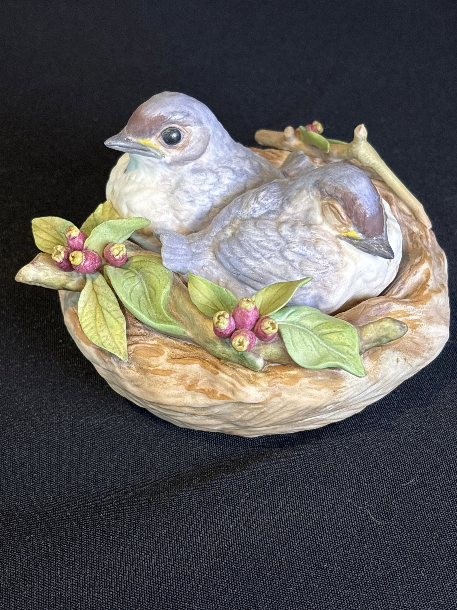 vintage Cybis porcelain figurine titled "Nestling Bluebirds“ 5 inches: vintage Cybis porcelain figurine titled "Nestling Bluebirds."This collectible bisque porcelain piece depicts two baby bluebirds nestled closely together inside a textured, woven-style nest surrounded 