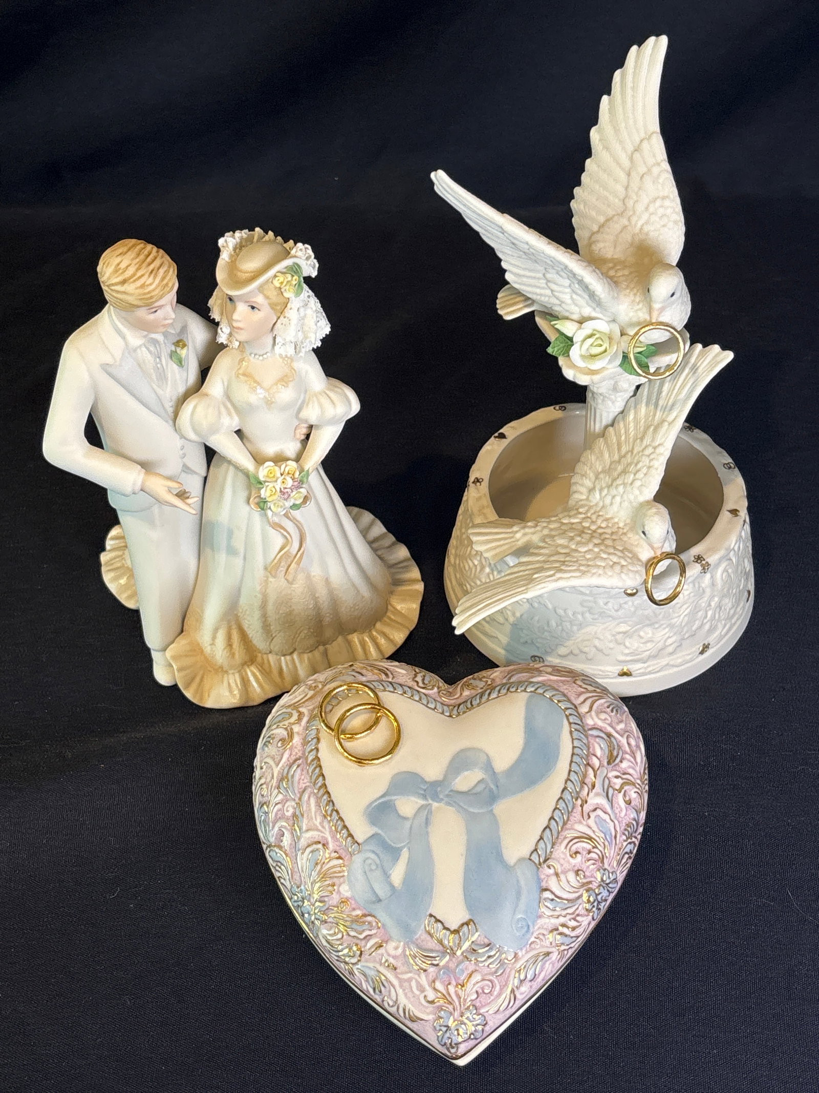 Three piece marital items; bride & groom, bridal centerpiece & wedding heart box: Three piece marital lines; The Bride and Groom: Titled Miniature Bride and Groom, this 7-inch-tall open edition sculpture was introduced by the studio in 1988. It is unique because it is the only