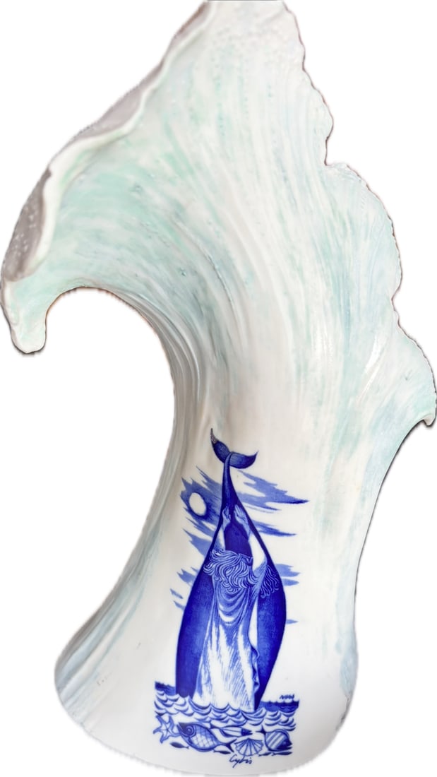 Cybis "Biblical Tales" design named "Jonah on Wave," created by George Ivers: Cybis "Biblical Tales" design named "Jonah on Wave," created by George Ivers.The piece features a dramatic wave shape with a white and pale green finish, depicting the whale looming behind Jonah.It