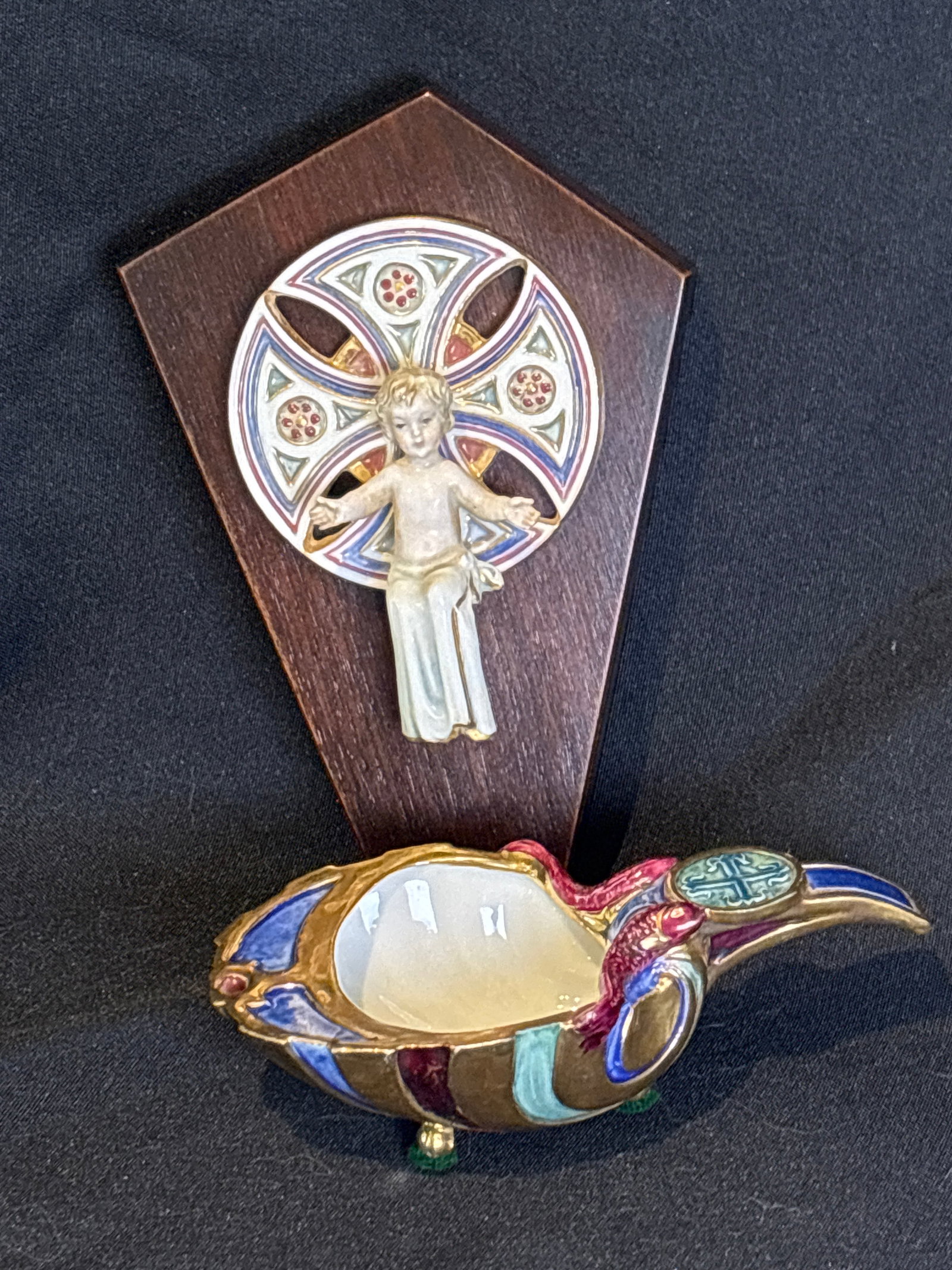Two rare Cybis Porcelain religious items: Two rare Cybis Porcelain religious items; unusual colored Baptismal Shell / Bonbonniere Dish. Key Features & Symbolic DetailsReligious Imagery: The piece features a prominent Christian cross nestled i
