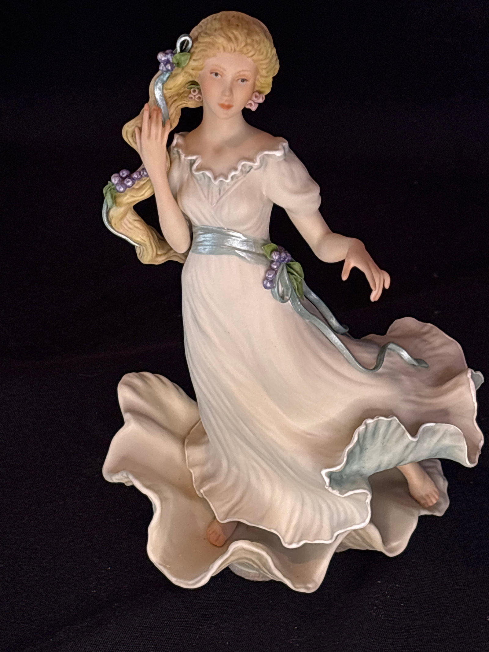 Retired Cybis 'Aphrodite' bisque porcelain 8.5 inch figurine: Cybis bisque porcelain figurine titled "Aphrodite".Key Details & CharacteristicsManufacturer: Cybis Porcelain StudioRelease Date: Introduced in 1983 and subsequently retiredDesign Features: Depicts th