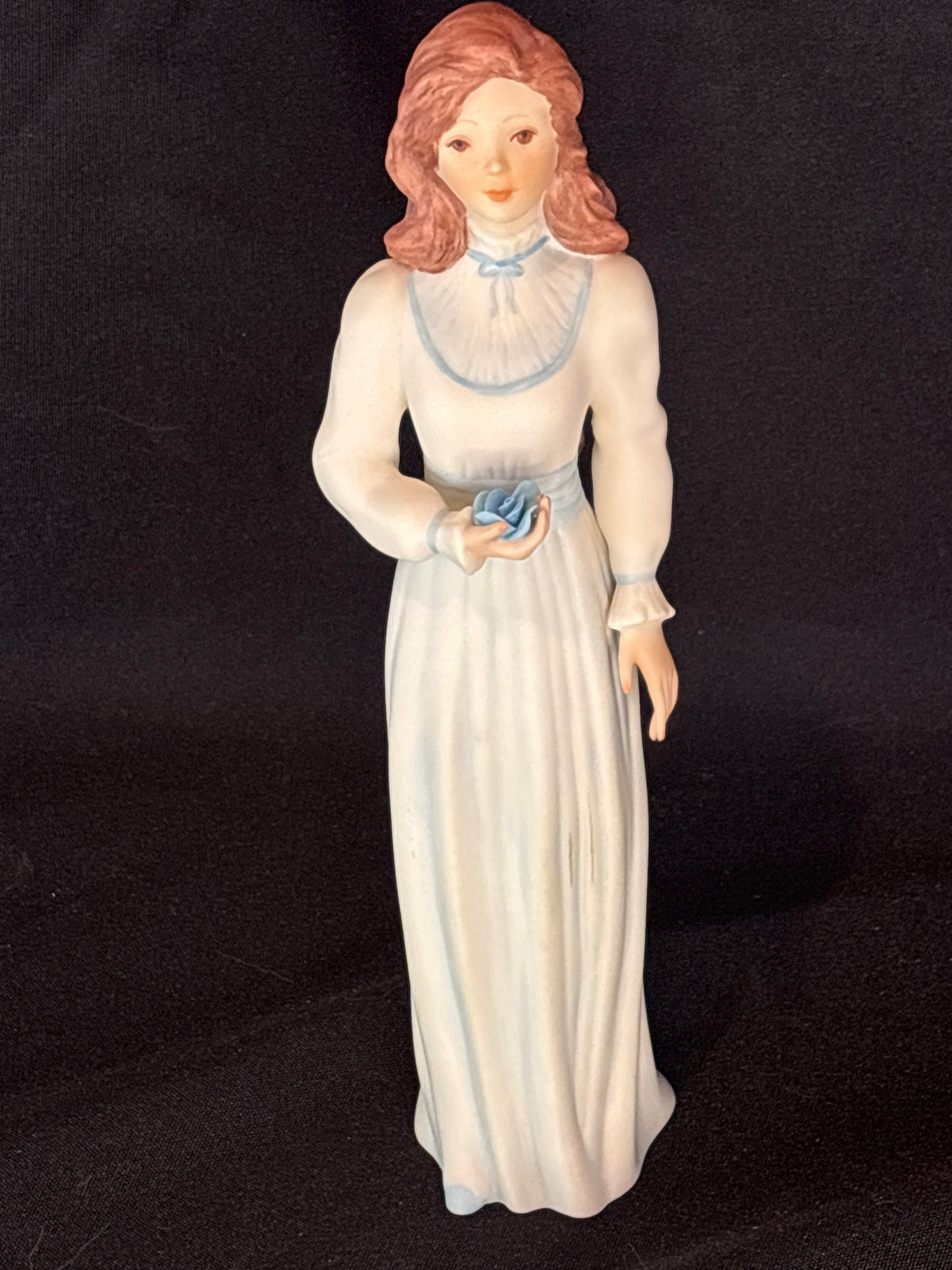 "Roberta," a special limited-edition variation of the "Young Rose" (Bridesmaid) sculpture: "Roberta," a special limited-edition variation of the "Young Rose" (Bridesmaid) sculpture by the historic American studio Cybis Porcelain.History & Design DetailsThe Origin: The original sculpture was