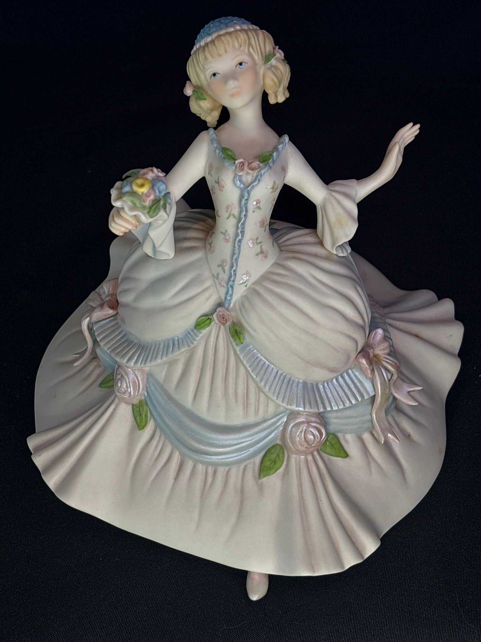 Cybis Cinderella at the Ball" (Item #4033) 9 inch sculpture: Cybis Porcelain Figurine "Cinderella at the Ball" (Item #4033) from the Charles Perrault Fairy Tales collection, introduced around 1980.It features a fine matte bisque porcelain finish with hand-paint