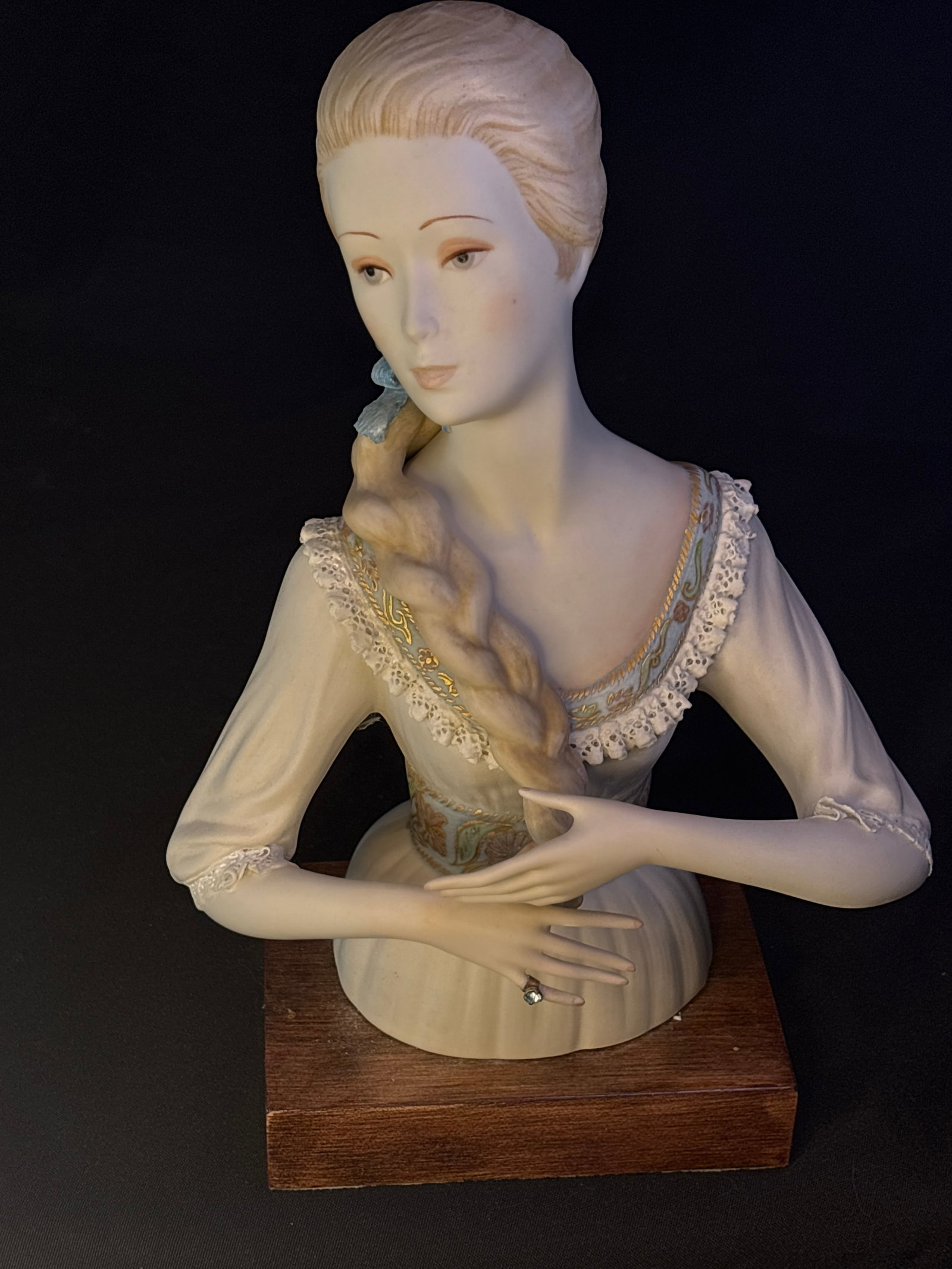 Limited edition Cybis "Guinevere" with ring bust figurine sculpted by Laszlo Ispanksy: Slight loss to ruffle on elbow...Uncommon with ring on finger; Cybis Porcelain "Guinevere" bust figurine sculpted by Laszlo Ispanky.Maker & Subject: Created by the American studio Cybis, this limited-