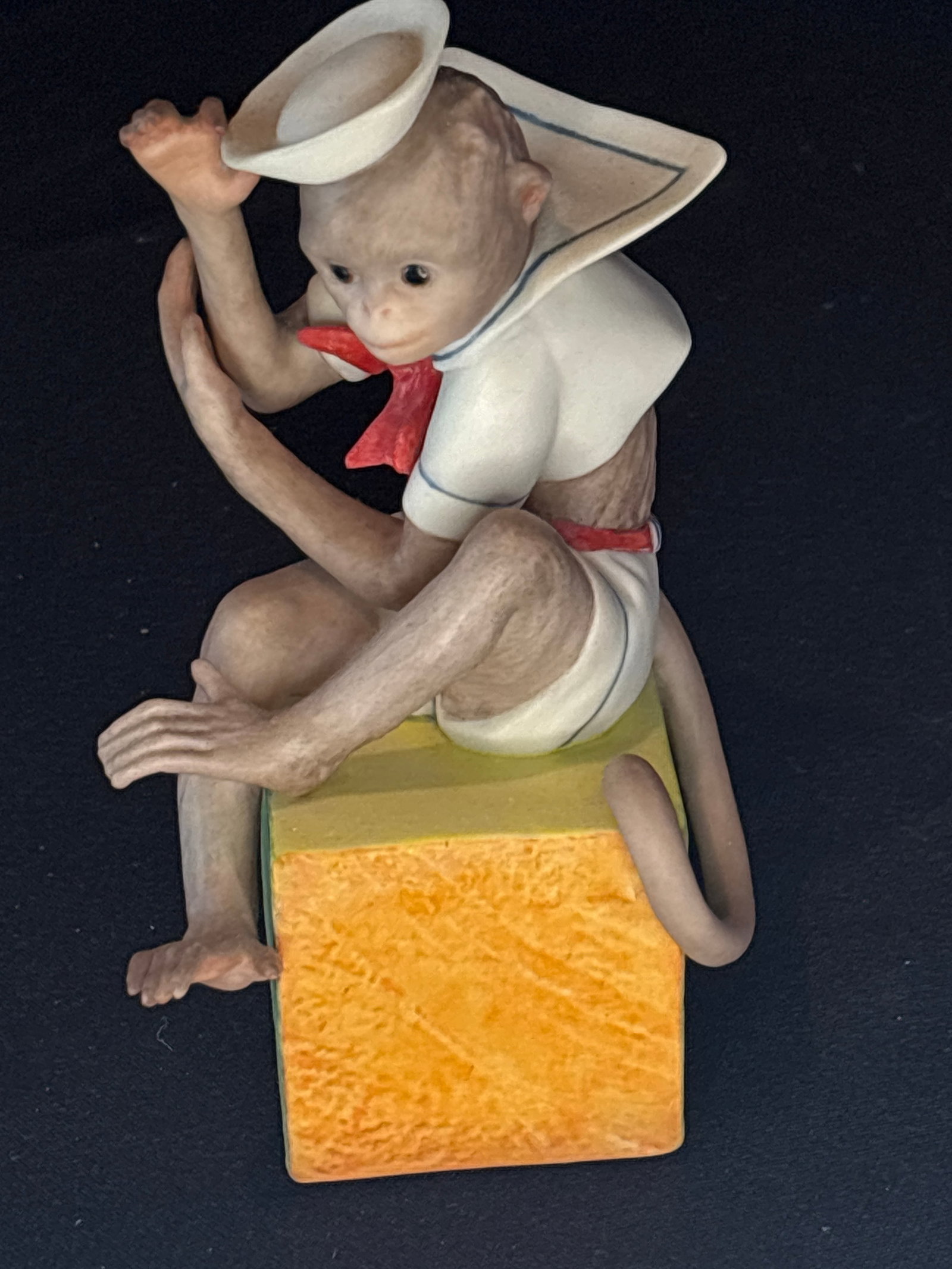 vintage Cybis porcelain 'Bosun the Monkey' 6 inch figurine: Bosun the Monkey, a vintage porcelain figurine produced by the renowned American studio Cybis Porcelain.Fine Art IdentificationCollection: Part of the highly collectible Cybis Circus Collection.Produc