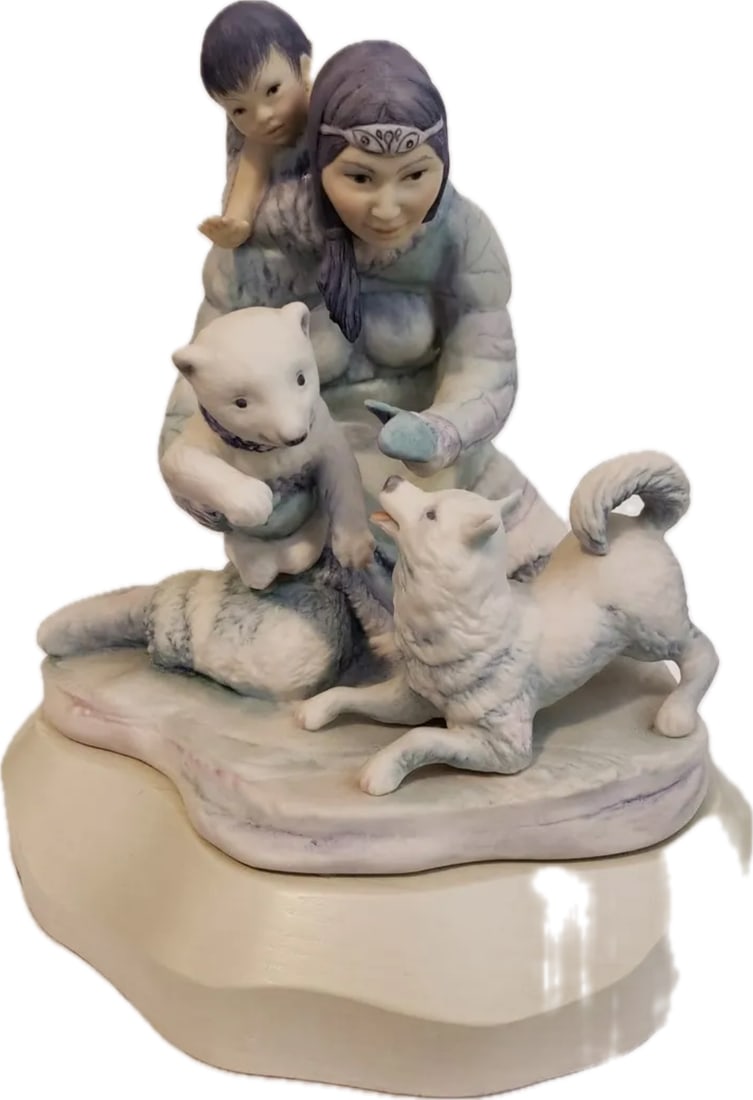 Limited editiin Cybis Eskimo Mother 'Alea' porcelain sculpture: Cybis Eskimo Mother "Alea" is a rare, limited-edition cold bisque porcelain sculpture introduced in 1973 by the Cybis Porcelain Studio. Designed by Helen Granger Young, it stands about 11 inches tall 
