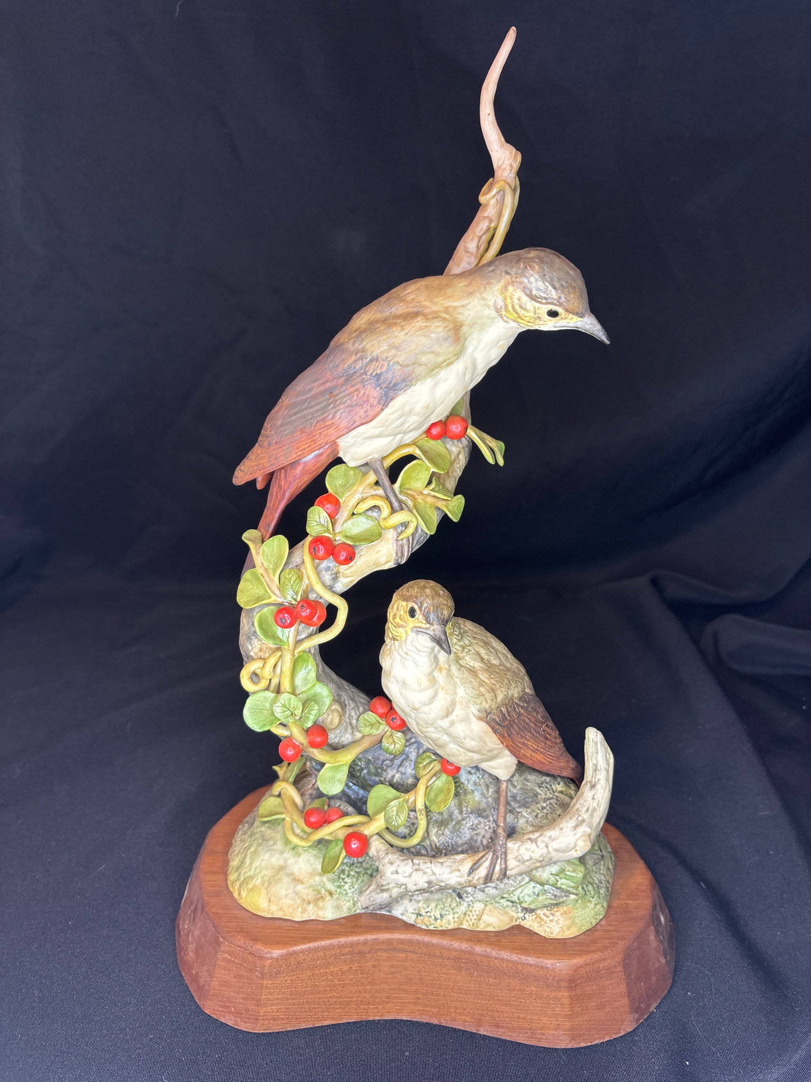 Limited edition 'Hermit Thrush with Cranberry Cotoneaster' design #380 porcelain sculpture: Cybis porcelain figurine titled "Hermit Thrush with Cranberry Cotoneaster" (Design Number 380).Key Details About This PieceHistory: This limited edition piece was introduced by the Cybis Porcelain stu