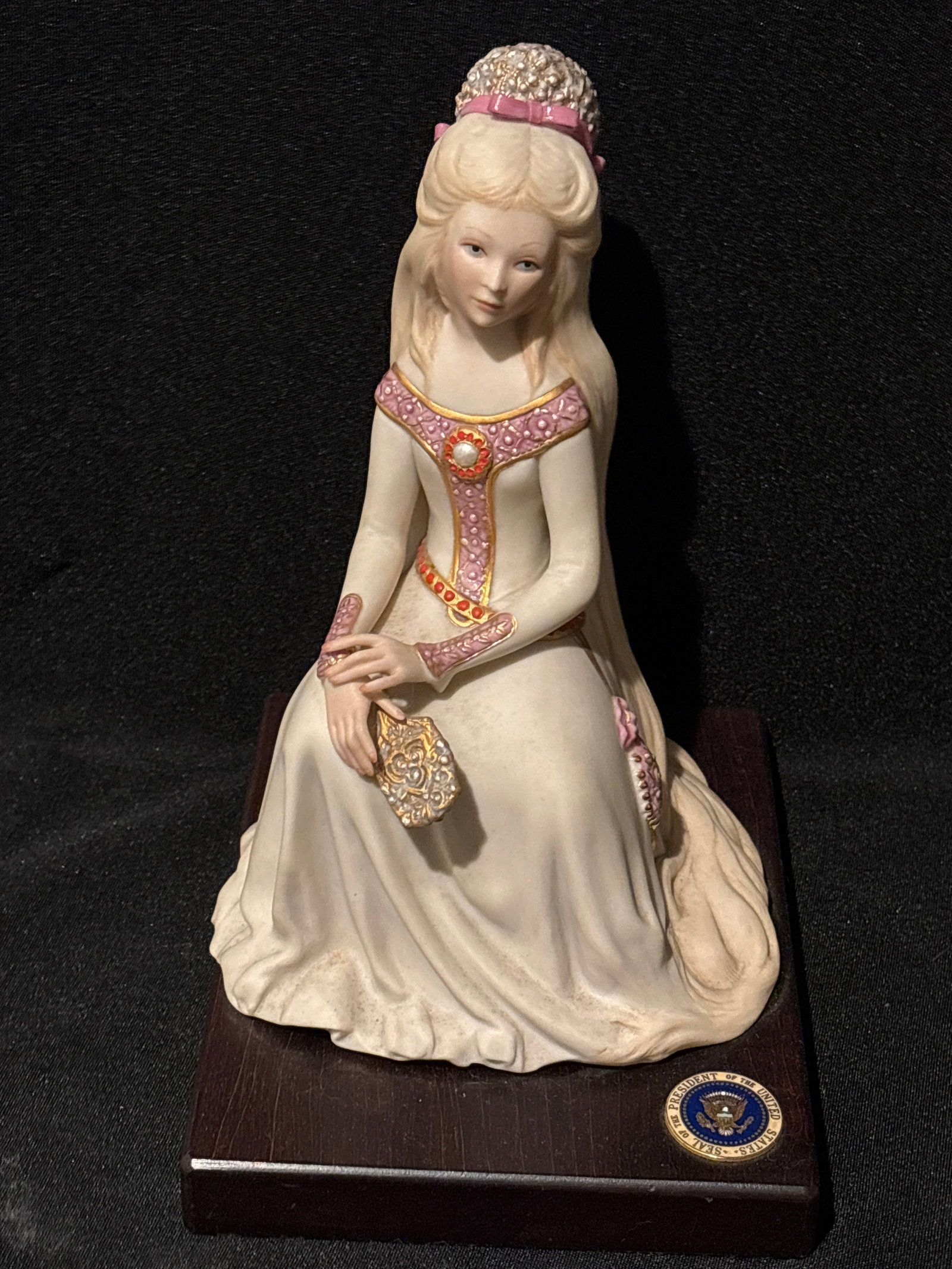 highly valuable historical memorabilia Presidential Seal Rapunzel 14.5 inch sculpture: Rapunzel figurine mounted on a wooden base with an authentic, inlaid presidential seal, the item bypasses the standard decorative porcelain market and enters the realm of highly valuable historical