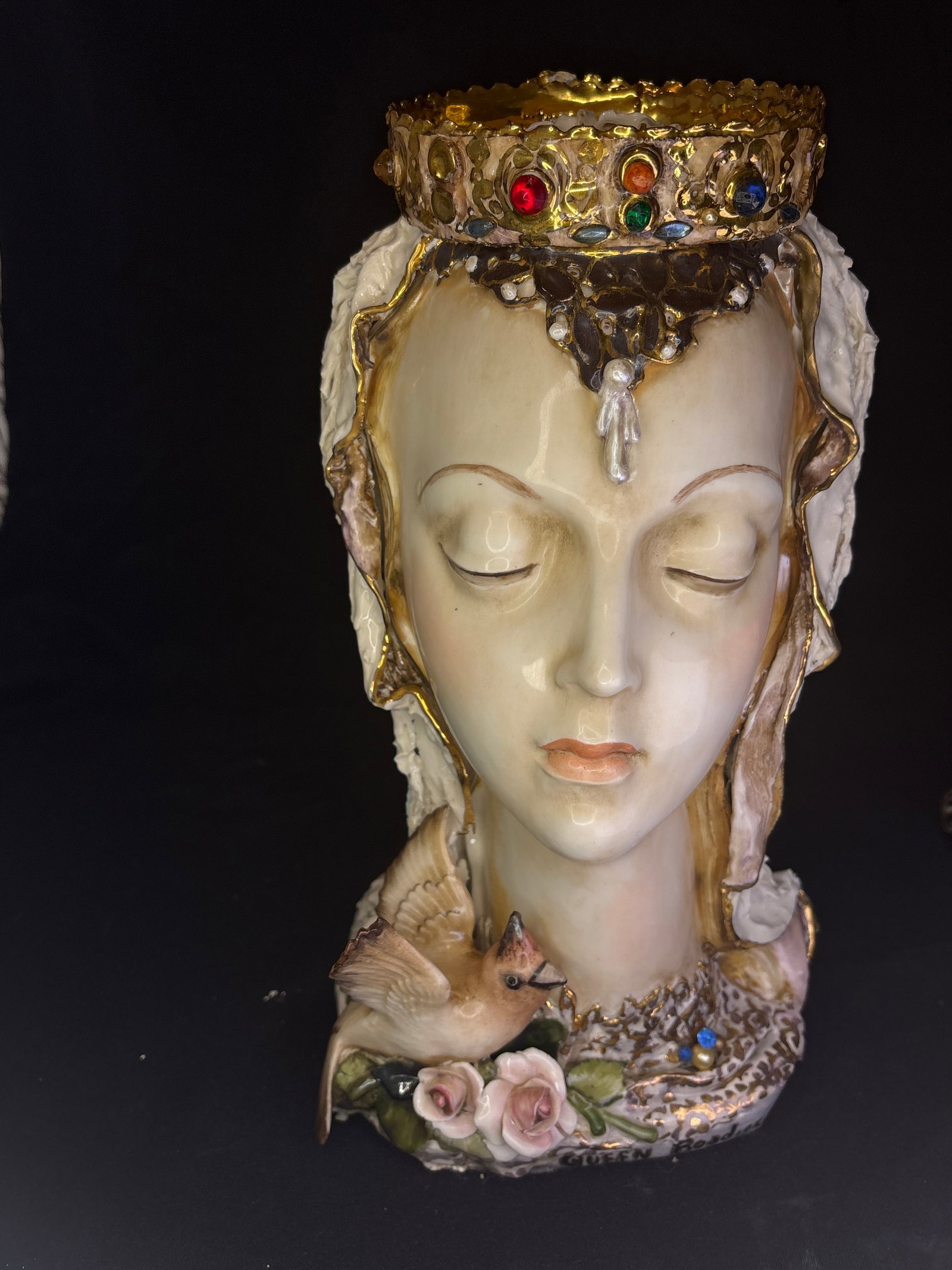 Possibly reworked or custom-altered vintage porcelain 13 inch bust Queen Boadicea: This piece appears to be a reworked or custom-altered vintage porcelain bust, likely starting from a 1950s/1960s Cybis or Cordey mold.While it bears a handwritten inscription reading "Queen Boadicea"