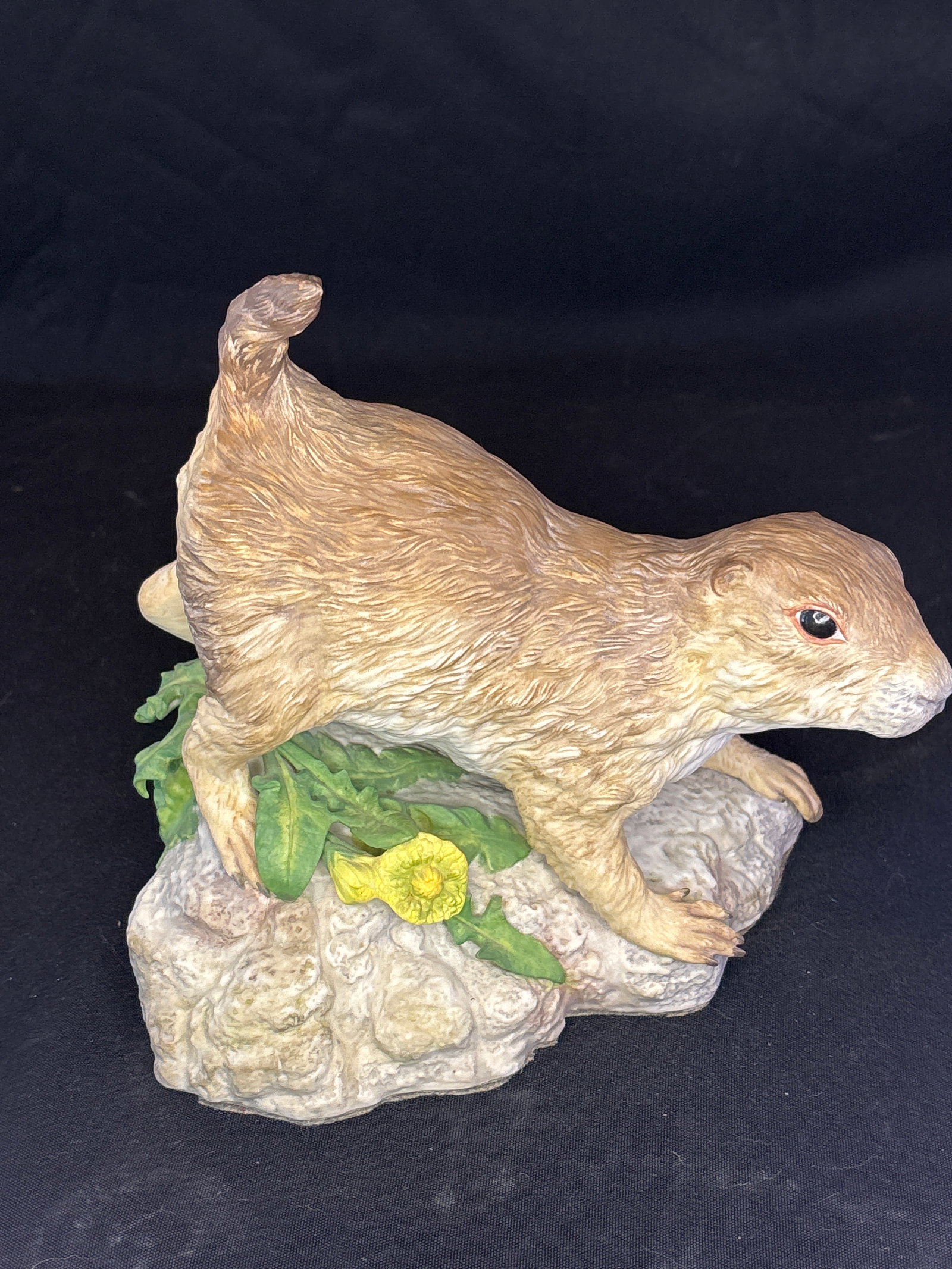 Cybis "Poko" the Prairie Dog 8 inch figurine: "Poko" the Prairie Dog, created by the renowned American studio Cybis Porcelain.About the PieceSculptor: Designed by Chuck Oldham as one of his initial modeling works for the studio.Production Years: 