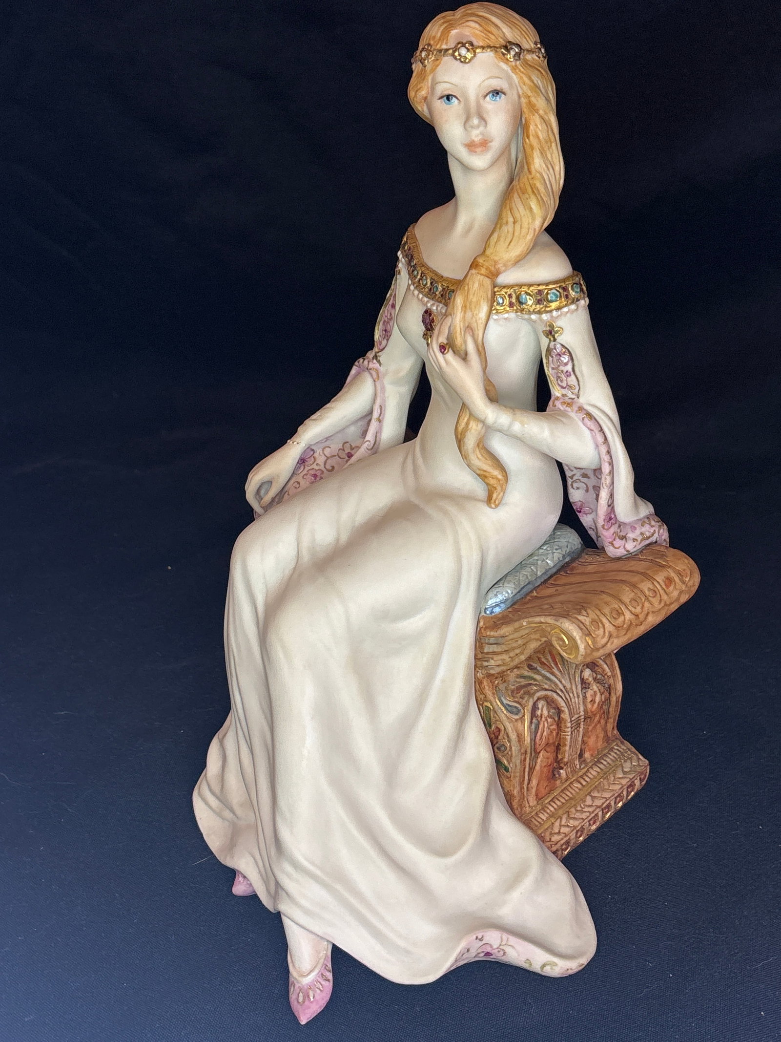 rare limited edition Cybis Queen Guinevere porcelain 10 inch sculpture: companion piece to the King Arthur sculpture is the rare Cybis Porcelain "Queen Guinevere" figurine. Introduced in 1983—two years prior to King Arthur—she was originally released as a standalone p