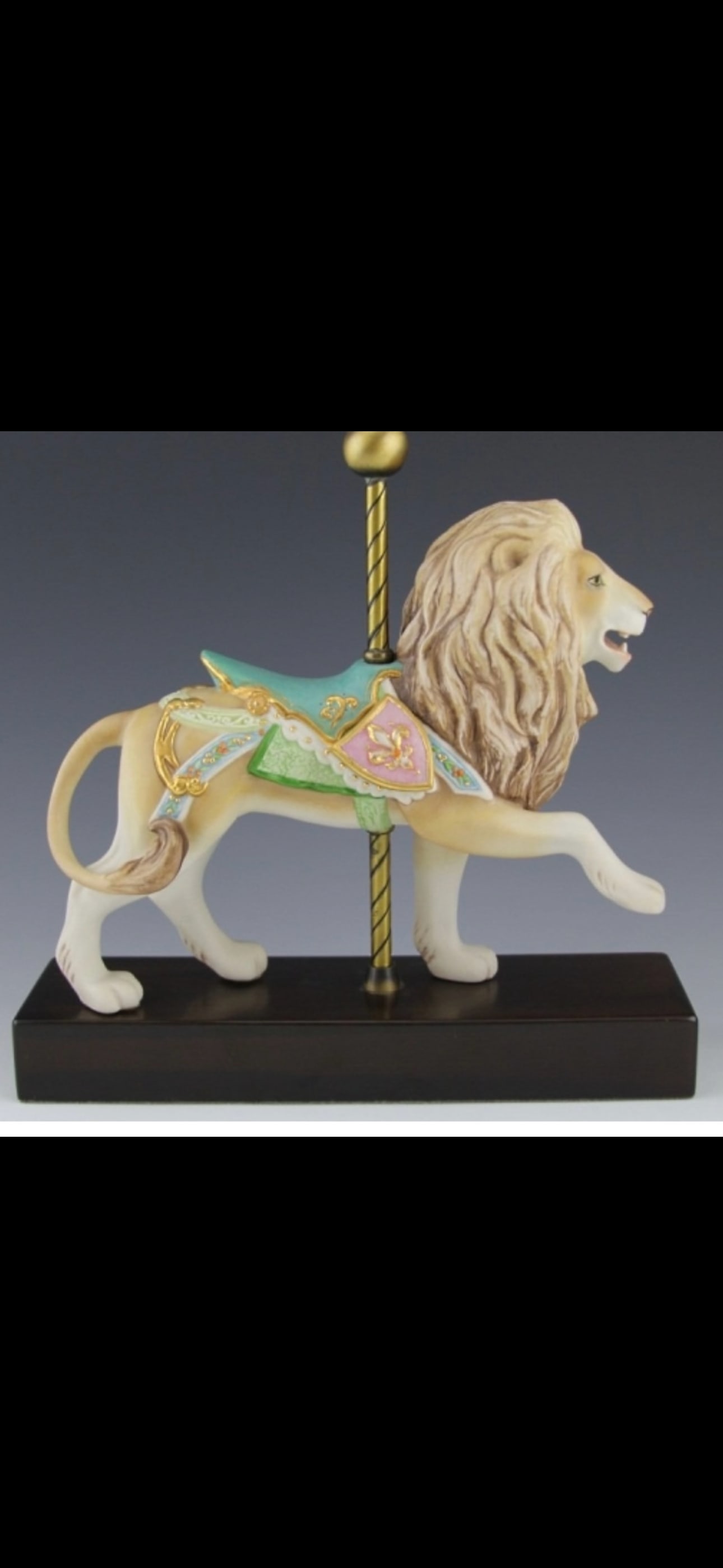 Limited edition Cybis carousel lion 12 inch sculpture: Cybis Carousel Lion is a limited-edition bisque porcelain sculpture introduced by the Cybis Studio in 1974.Key DetailsSculptor: Designed by Susan Clark Eaton as part of the Carousel Animals collection