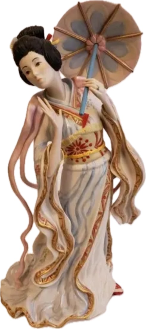 Highly coveted limited editiin Cybis "Madame Butterfly" 13.5 inch sculpture: Cybis "Madame Butterfly" is a highly coveted, limited-edition bisque porcelain figurine. Released 1984 Inspired by Giacomo Puccini’s famous opera, this intricate sculpture is part of the studio's "M