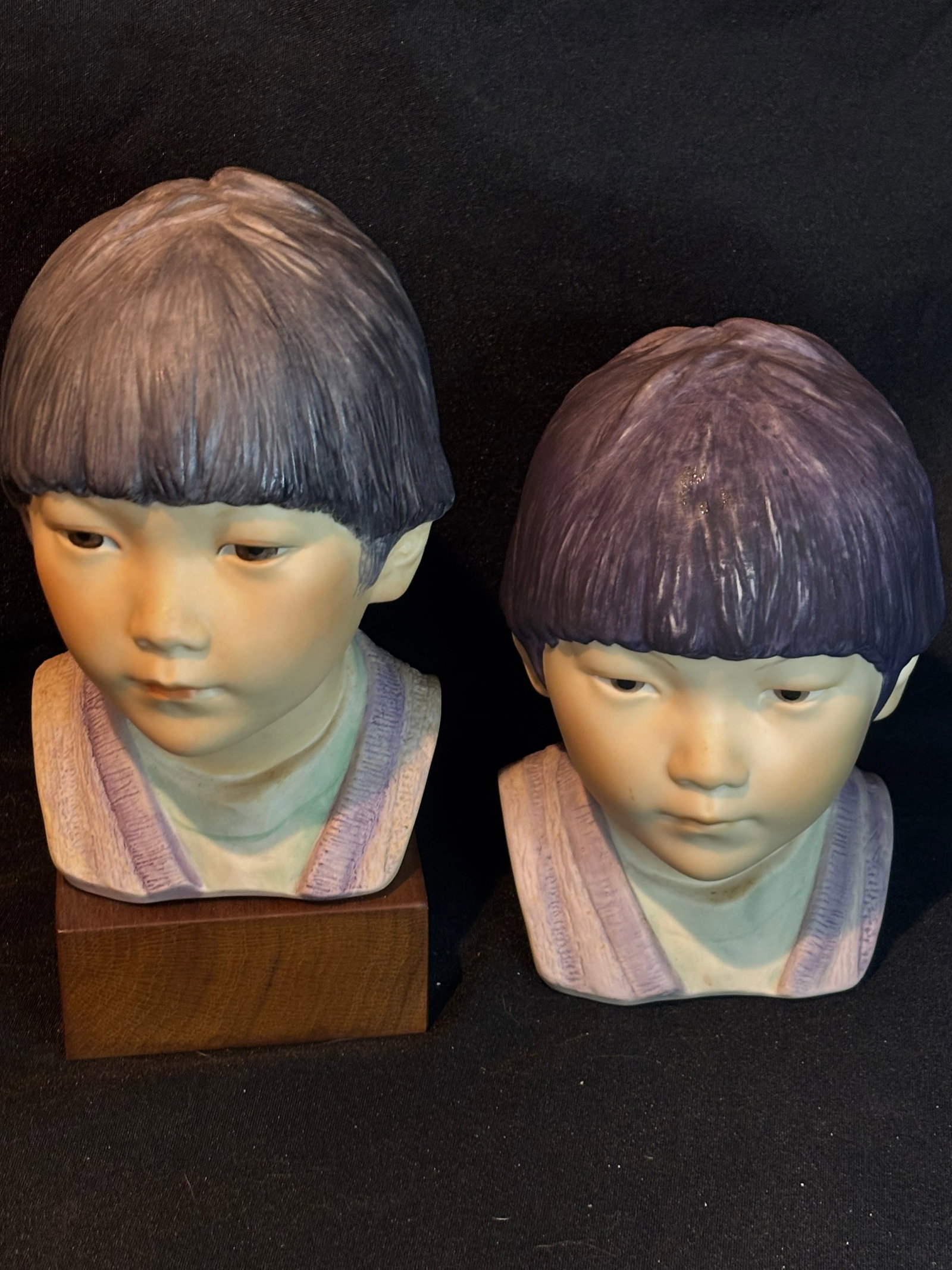 Two vintage Cybis hand-painted porcelain bust titled "[Cheerful Dragon]: Two vintage hand-painted porcelain bust titled "[Cheerful Dragon]" (also known as Shi Lun) created by the American studio Cybis Porcelains in 1979 as part of their Children of the World collection.It 
