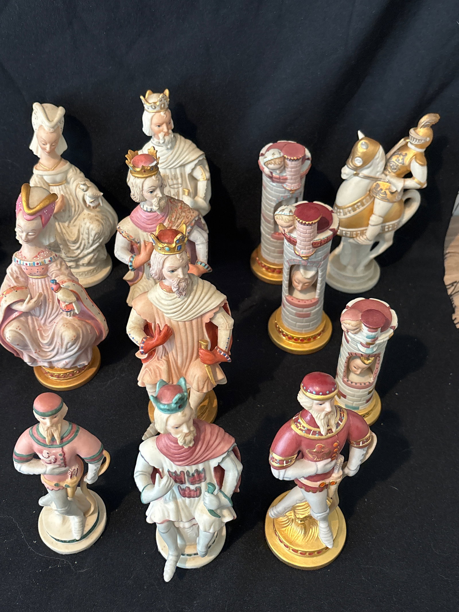Burgundy Twelve piece similar unsigned Cybis white porcelain chess figures (1 of 9)