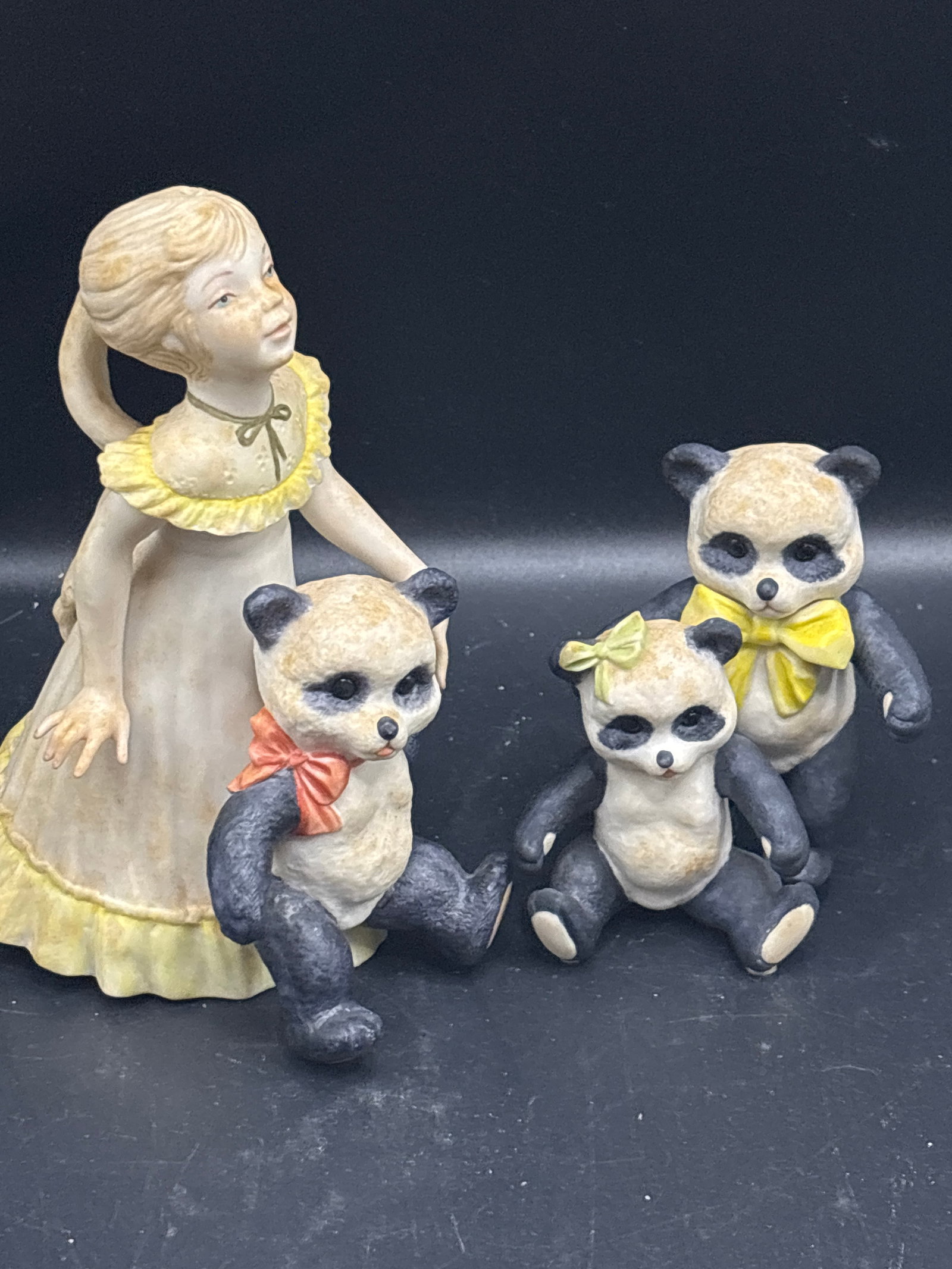 Two Cybis porcelain bisque figurines, one with pandas & one titled "Goldilocks (1 of 8)