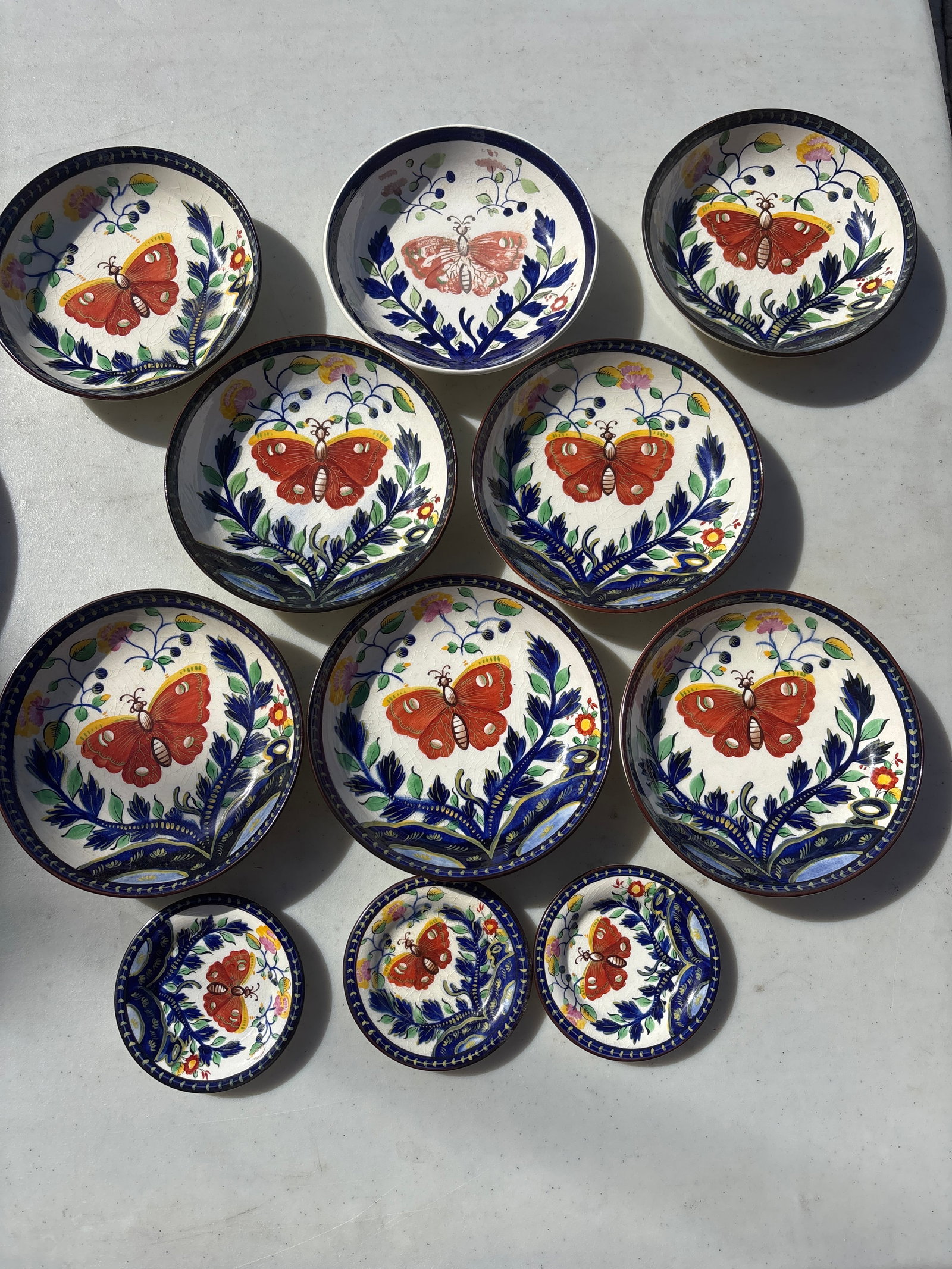 RARE Eleven 1940's Cybis Gaudy Dutch "Butterfly" pattern bowls: Eleven 1940's Cybis Gaudy Dutch "Butterfly" pattern bowls. While it looks nearly identical to original 19th-century English Staffordshire pearlware, the query "cybis" points directly to its specific o