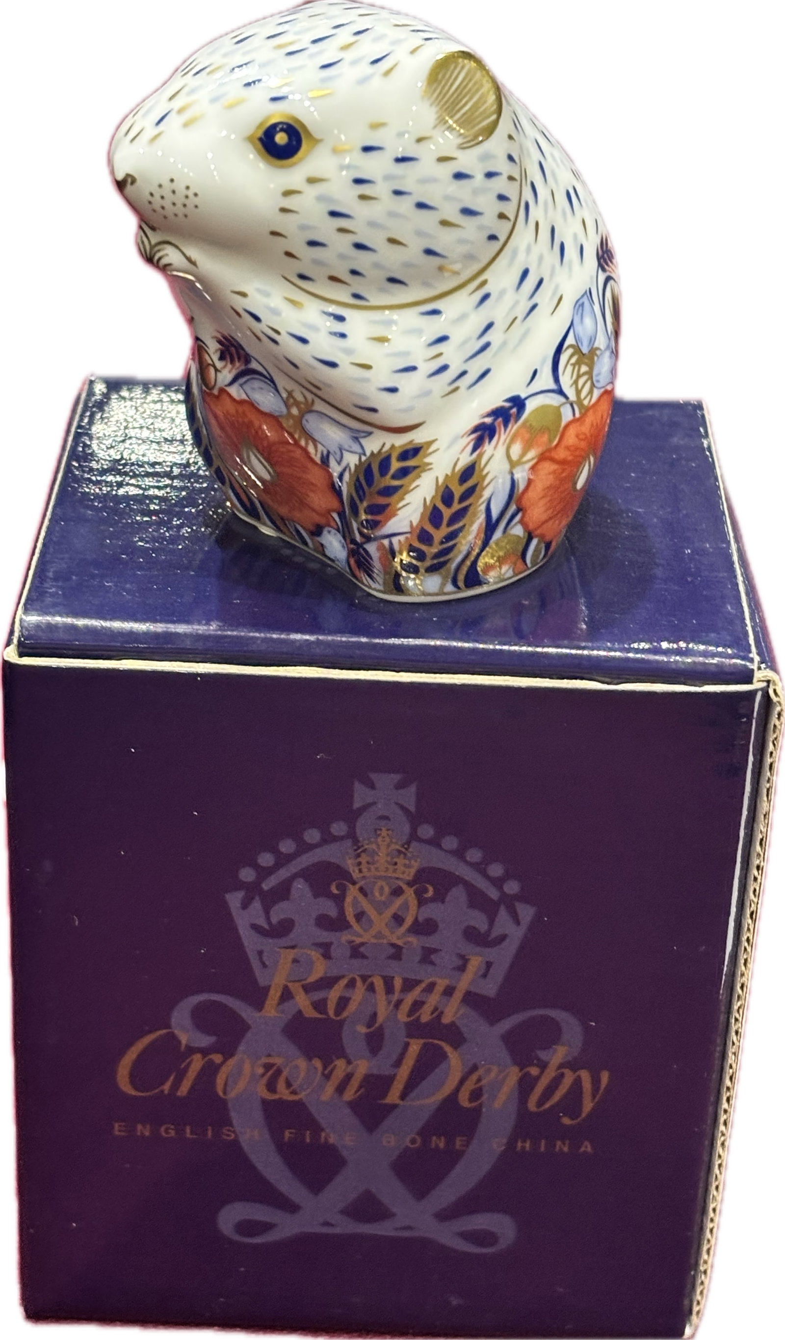 Collectors Guild exclusive Royal Crown Derby English ‘Poppy Mouse’ 2&1/4 inch paperweight: Royal Crown Derby "Poppy Mouse" paperweight, specifically a Collectors Guild exclusive edition.It is crafted from fine bone china and features a distinct Imari pattern with vibrant blue and orange flo