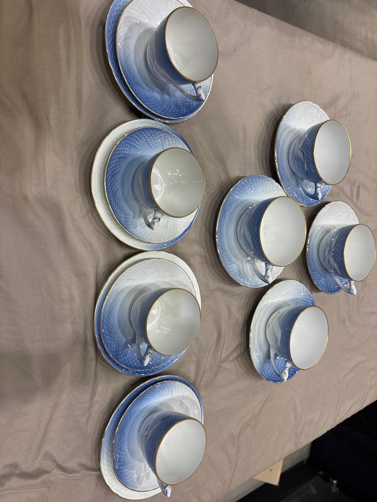 Eighteen piece Bing & Grondahl Seagull porcelain cup and saucer sets: Eighteen piece Bing & Grondahl Seagull porcelain cup and saucer sets from Denmark.The pattern features a distinctive seagull motif and gold trim.These items are often found as vintage pieces dating ba