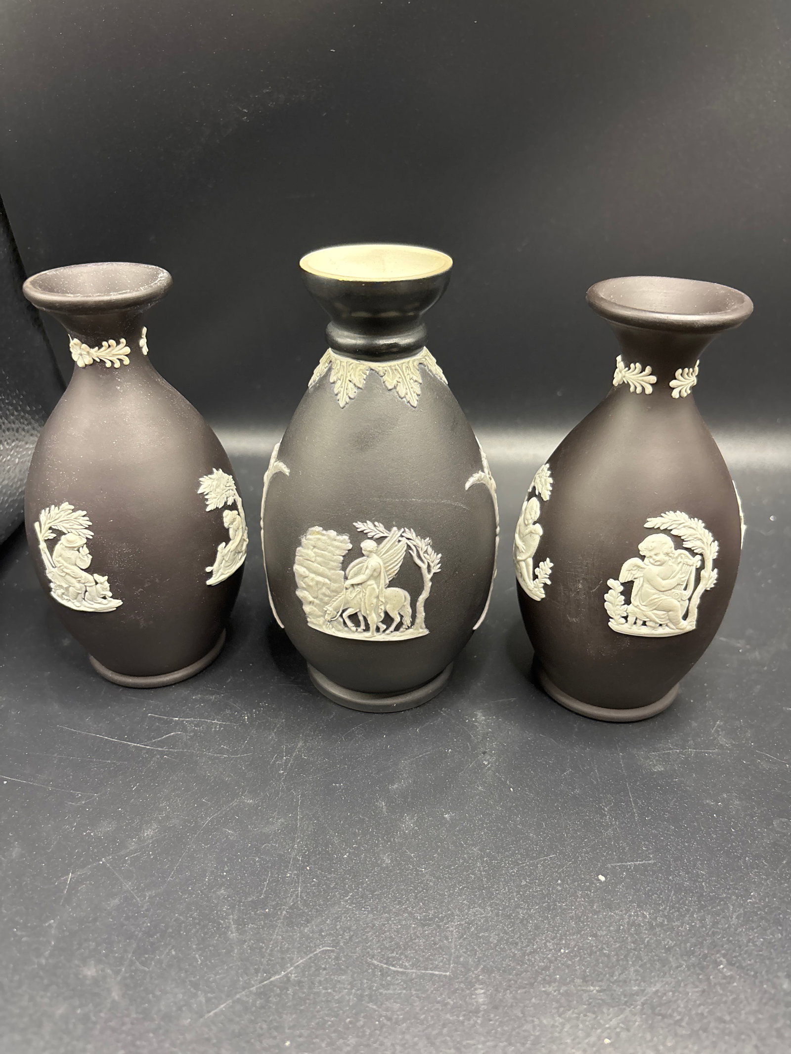 Three similar signed vintage Wedgwood Jasperware black basalt with white relief vases (1 of 6)