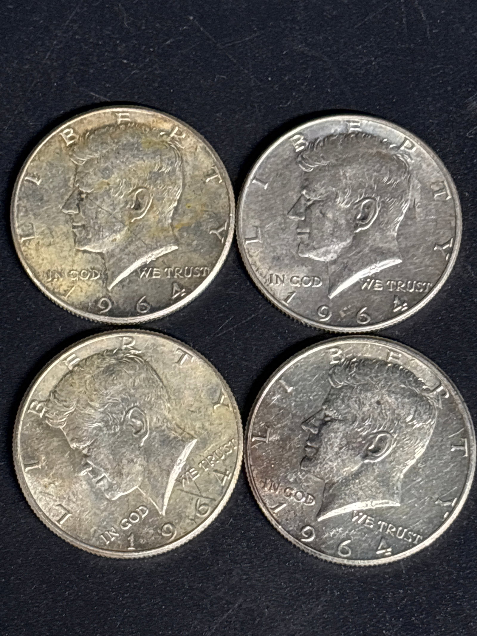 Group of four 1964 Kennedy Silver half dollars (1 of 4)