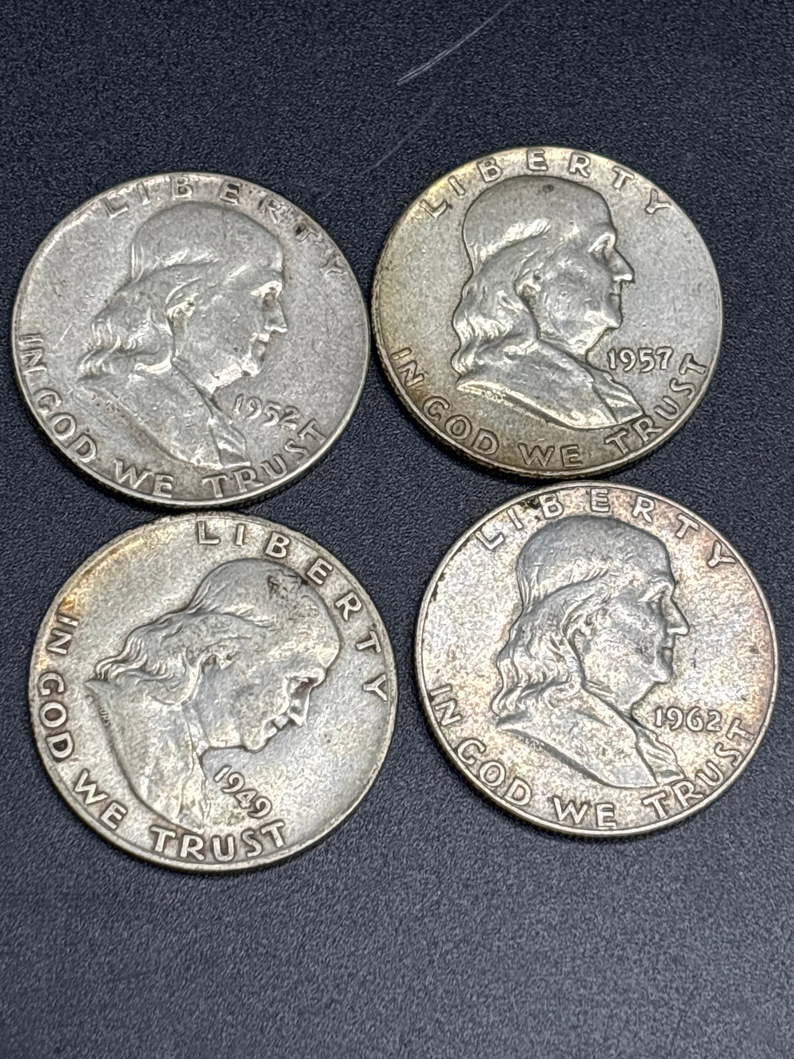 Group of four Silver U.S. Benjamin Franklin Half Dollars: Group of four early Silver U.S. Benjamin Franklin Half Dollars, minted between 1892 and 1915.It is composed of 90% silver.The value depends on the year, mint mark, and condition, with some circulated 