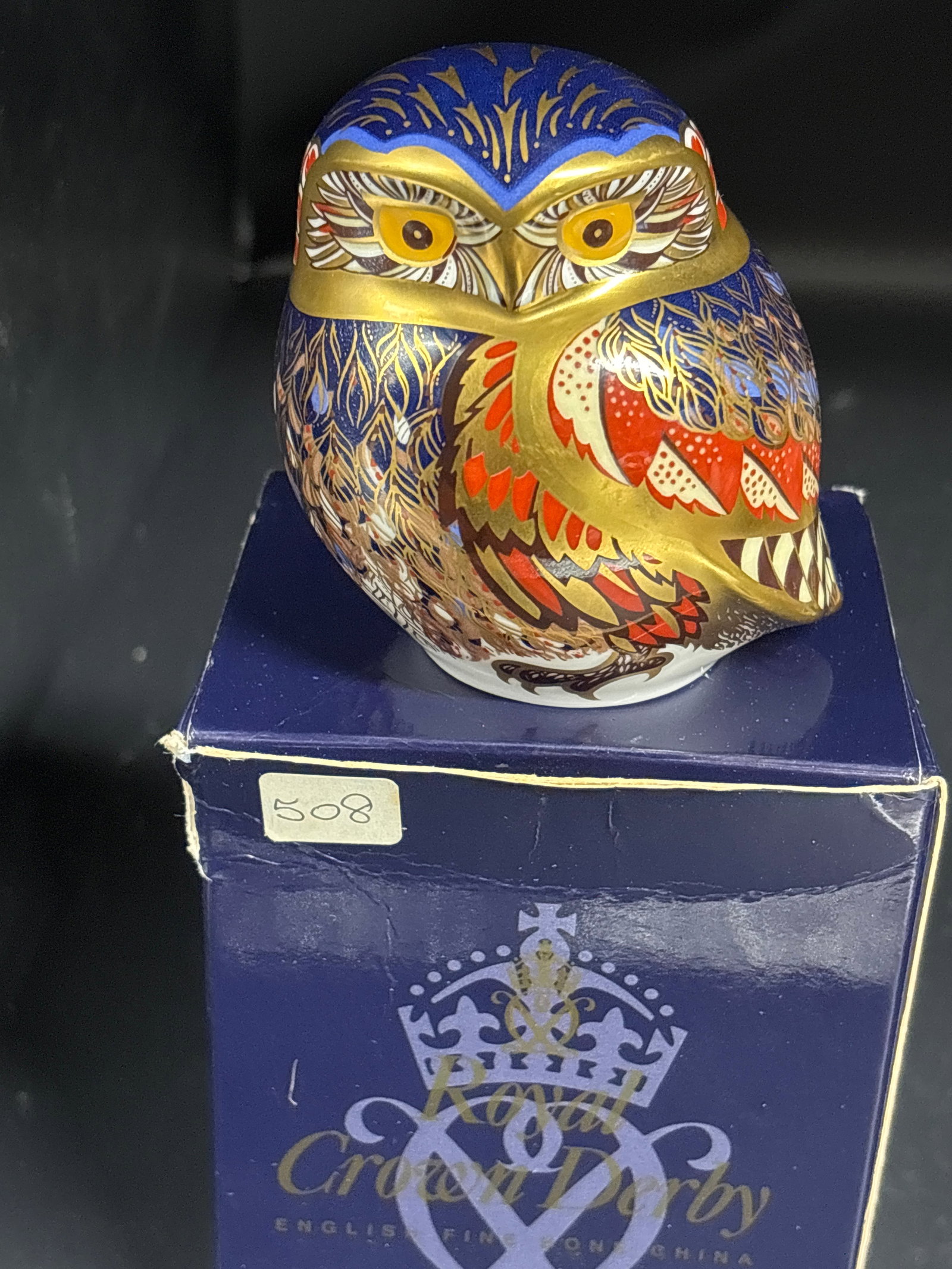 Royal Crown Derby English bone china "Little Owl" 3.5 inch paperweight: Gold stopper, with box (worn). Royal Crown Derby "Little Owl" paperweight, originally introduced in 1998 and designed by John Ablitt.The figurine is crafted from fine bone china and features a distinc