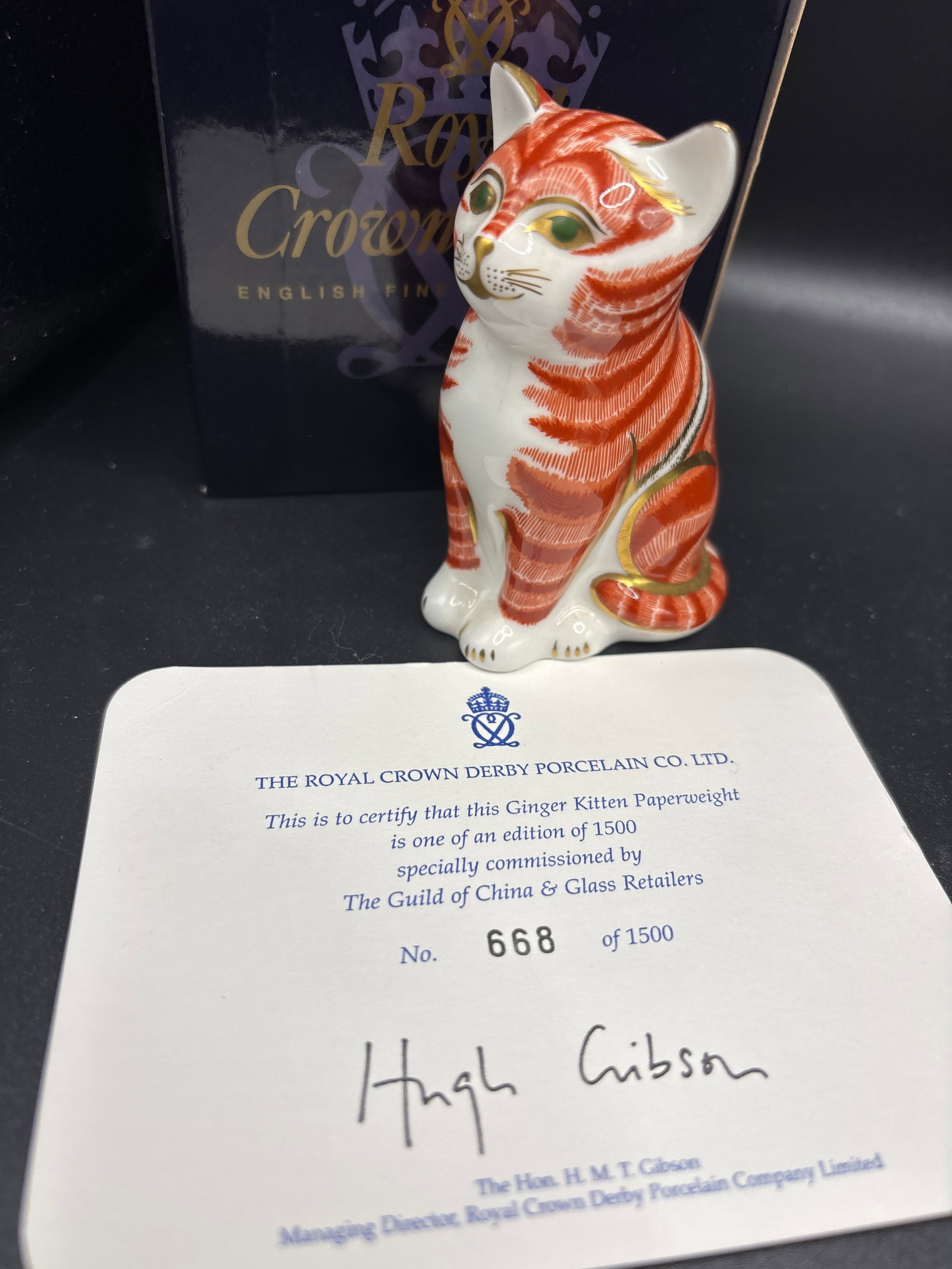 Specially commissioned Royal Crown Derby "Sitting Ginger Kitten" paperweight: With certificate of authenticity, Gold stopper, with box. Specially commissioned Royal Crown Derby "Sitting Ginger Kitten" paperweight, part of the English bone china collection.The figurine is design