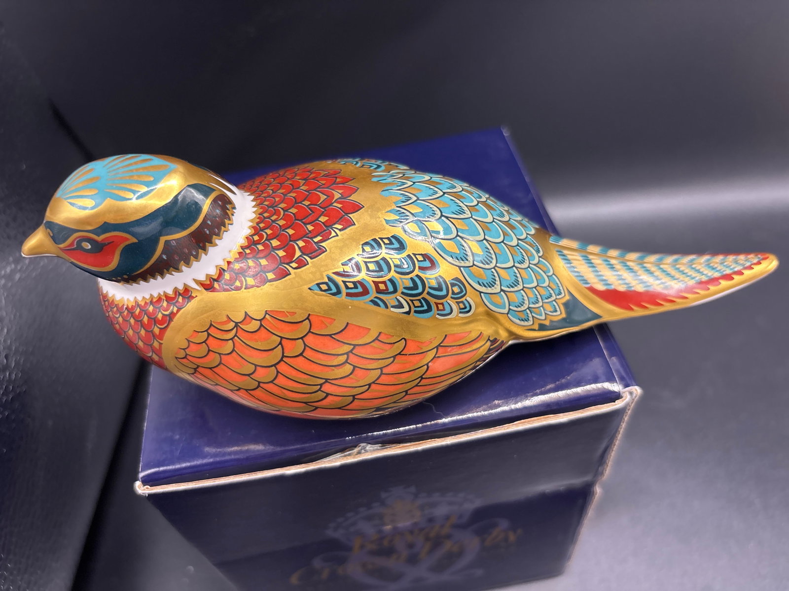 Artist signed Exclusive Royal Crown Derby "Woodland Pheasant " paperweight: Large, Gold stopper, with box. Royal Crown Derby Woodland Pheasant paperweight. This highly collectible fine bone china figurine is decorated with an intricate Imari pattern featuring vibrant orange, 