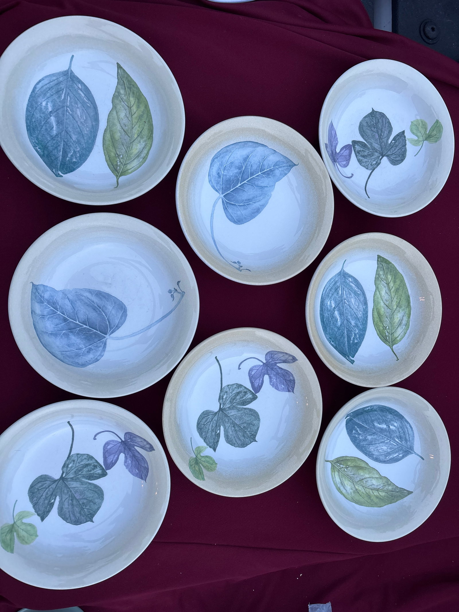Set of eight large bowls Portmeirion "Seasons Leaves": Portmeirion "Seasons Leaves" designed by Anwyl Cooper-Willis.Design: The earthenware pieces feature various embossed leaf patterns.Origin: These items were made in Britain.Collection: They are part of