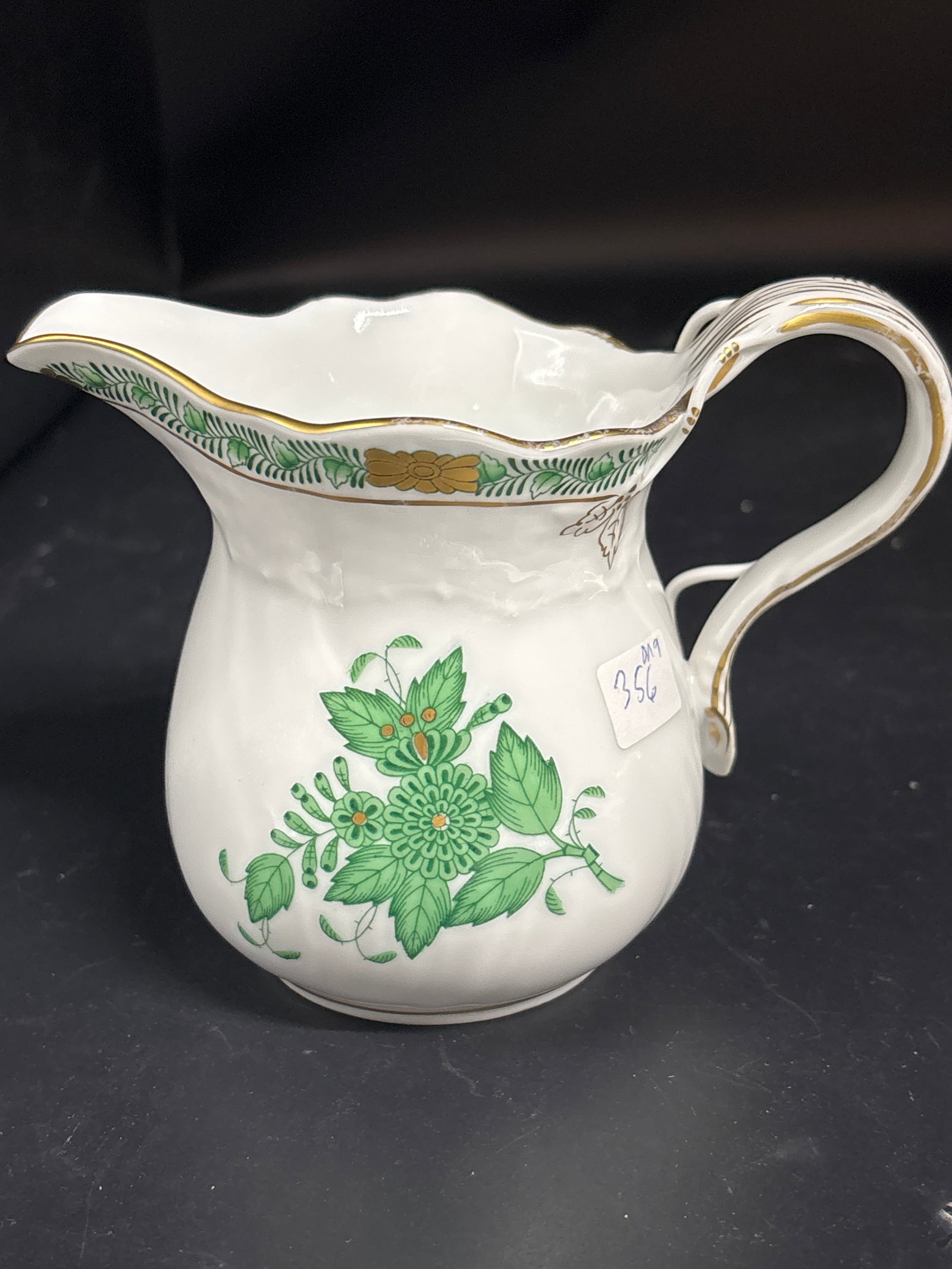 Herend Chinese Bouquet Green Creamer in the Apponyi pattern: creamer is a Herend Chinese Bouquet Green Creamer in the Apponyi pattern, distinguished by its hand-painted green floral design and 24kt gold trim.Model Number: Generally identified as model #1642 or 