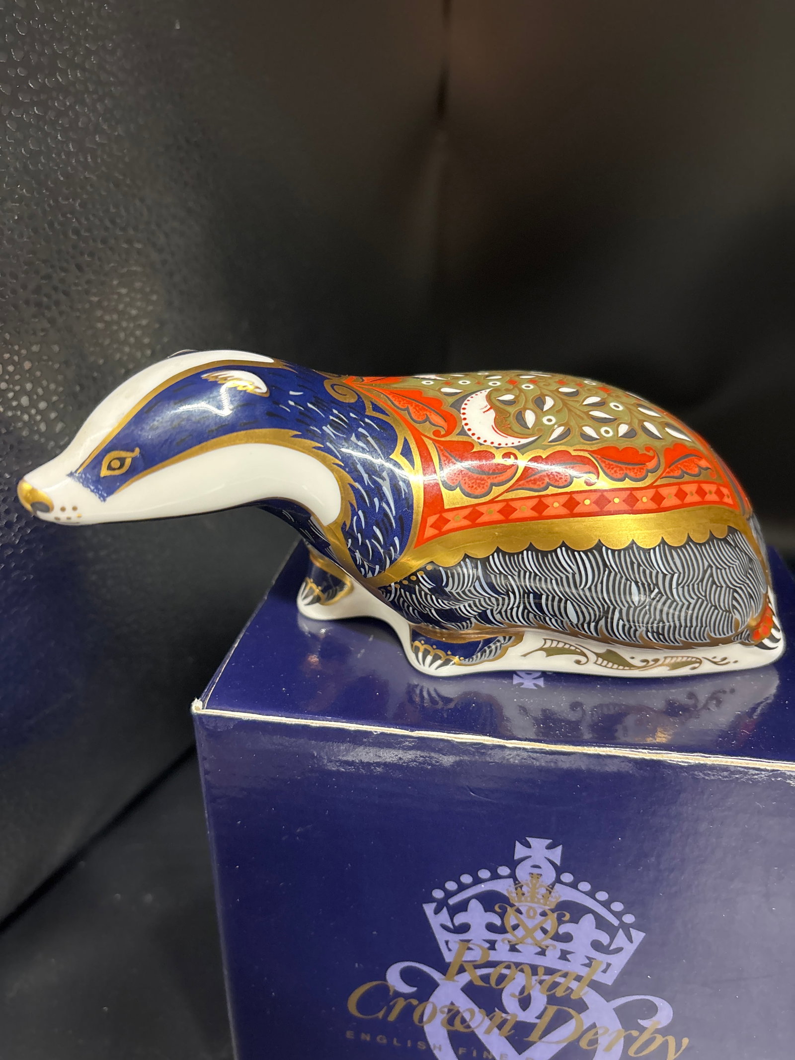Large Exclusive Moonlight Badger Royal Crown Derby England 6 inch Paperweight: Gold stopper. With box. Royal Crown Derby "Moonlight Badger" Paperweight, a highly collectible fine bone china figurine made in England.Key DetailsCollection: This piece was issued as an exclusive
