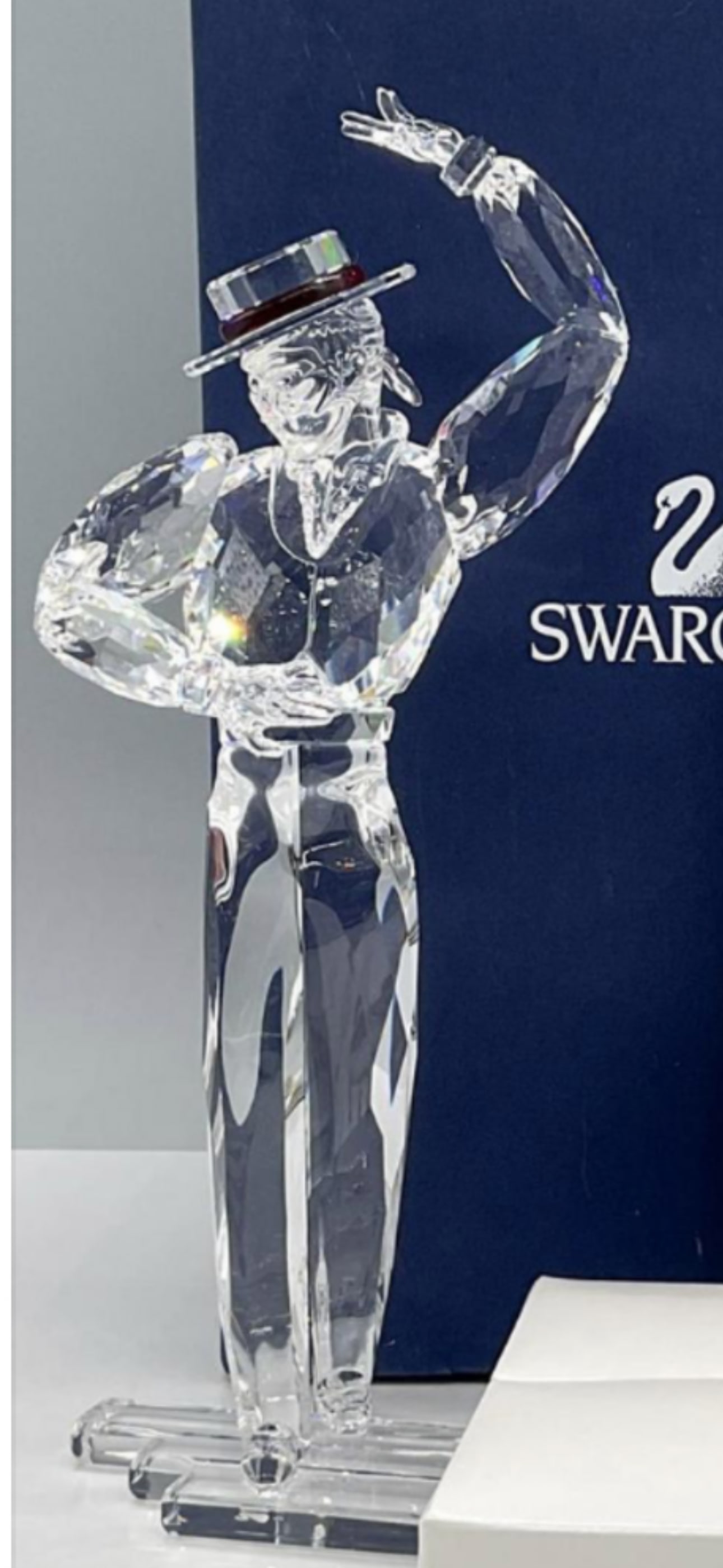 Swarovski SCS Annual Edition 2003 "Antonio" (SKU 606441) 8.25 inch sculpture: Swarovski SCS Annual Edition 2003 "Antonio" (SKU 606441) is a highly collectible, retired crystal figurine designed by Martin Zendron. It was issued exclusively to members of the Swarovski Collectors 